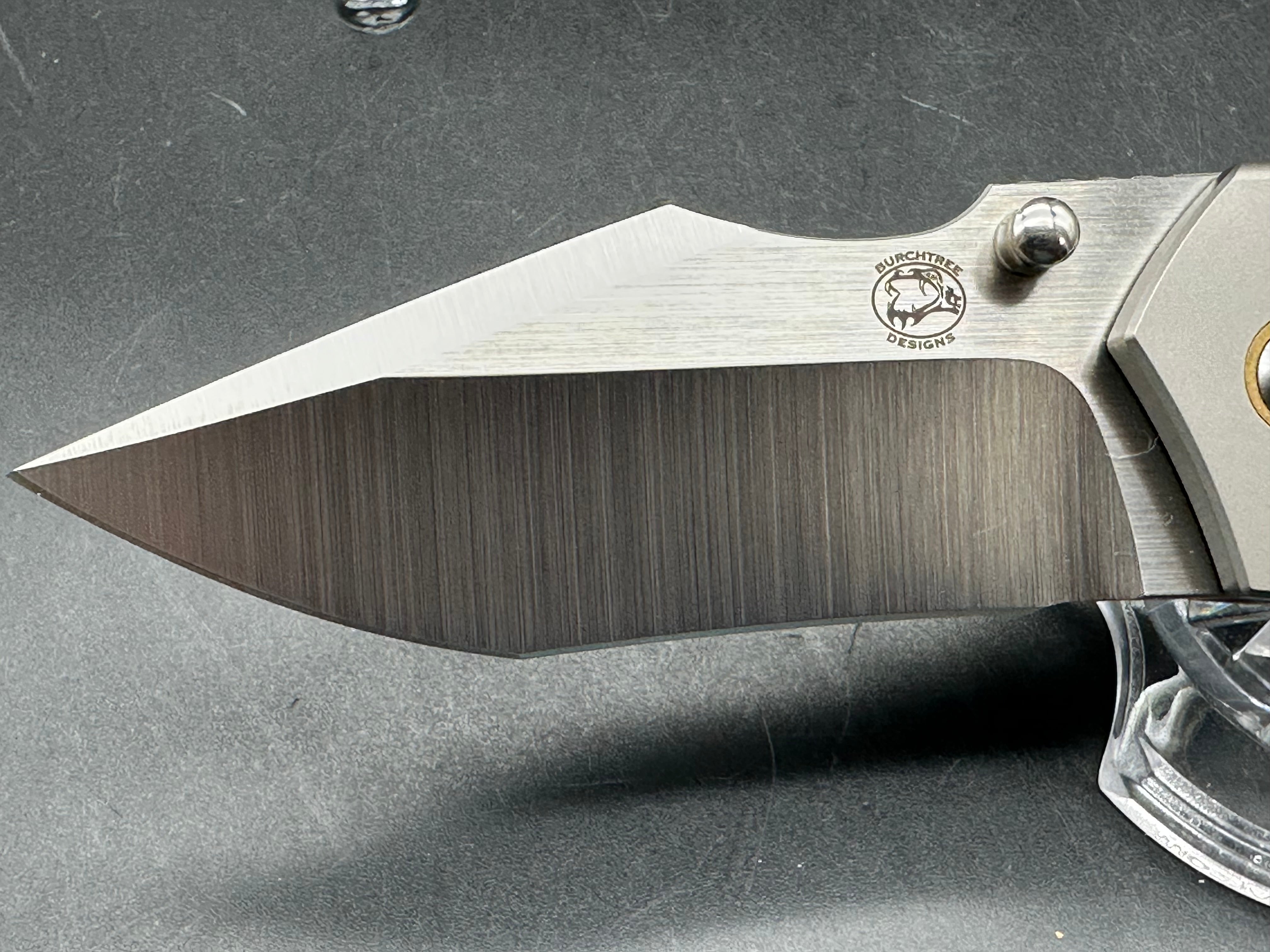 Burchtree Designs Secant Michael Burch design. 3.125 inch satin Bohler M390 blade. Titanium and carbon fiber frame