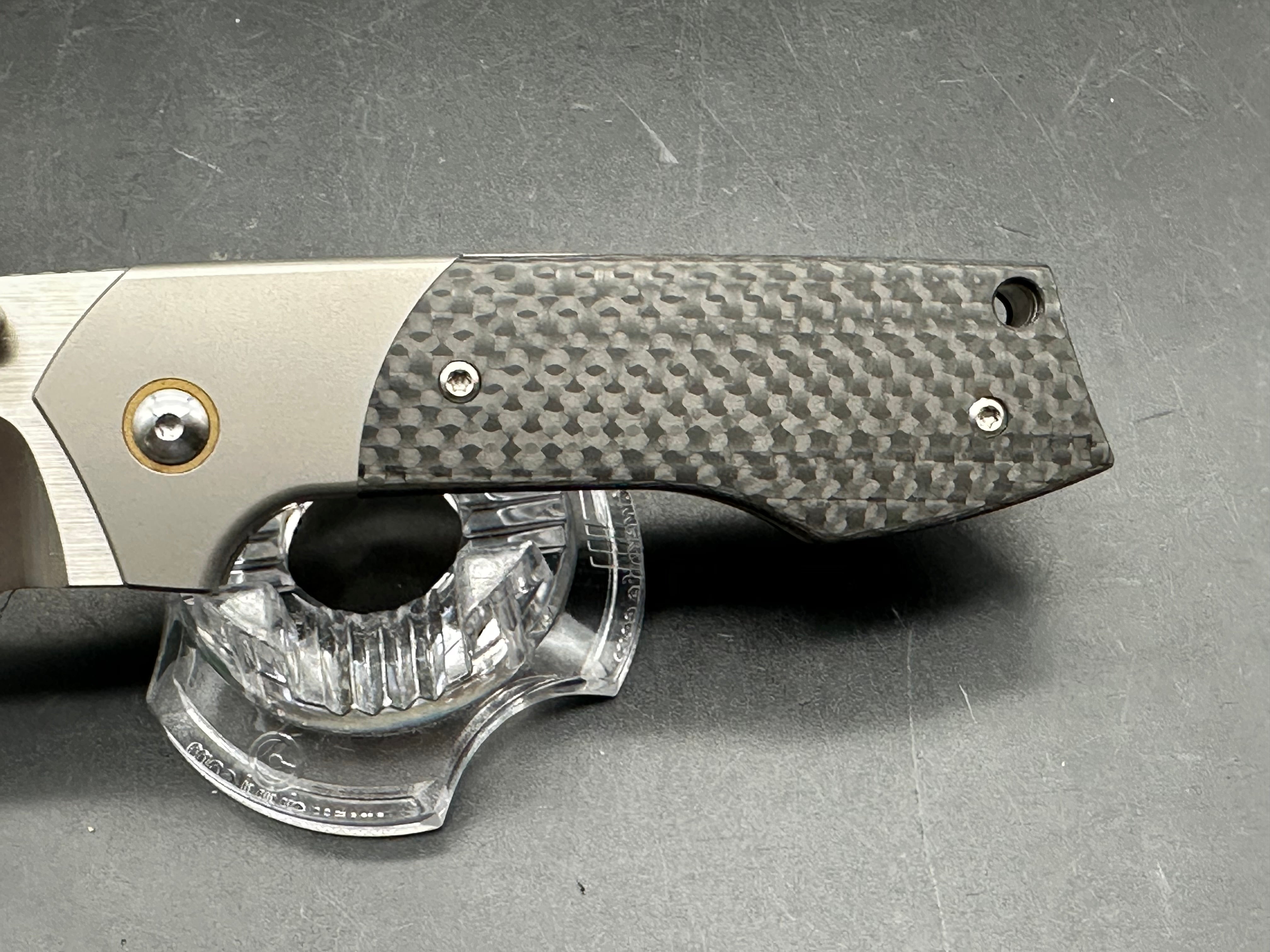 Burchtree Designs Secant Michael Burch design. 3.125 inch satin Bohler M390 blade. Titanium and carbon fiber frame