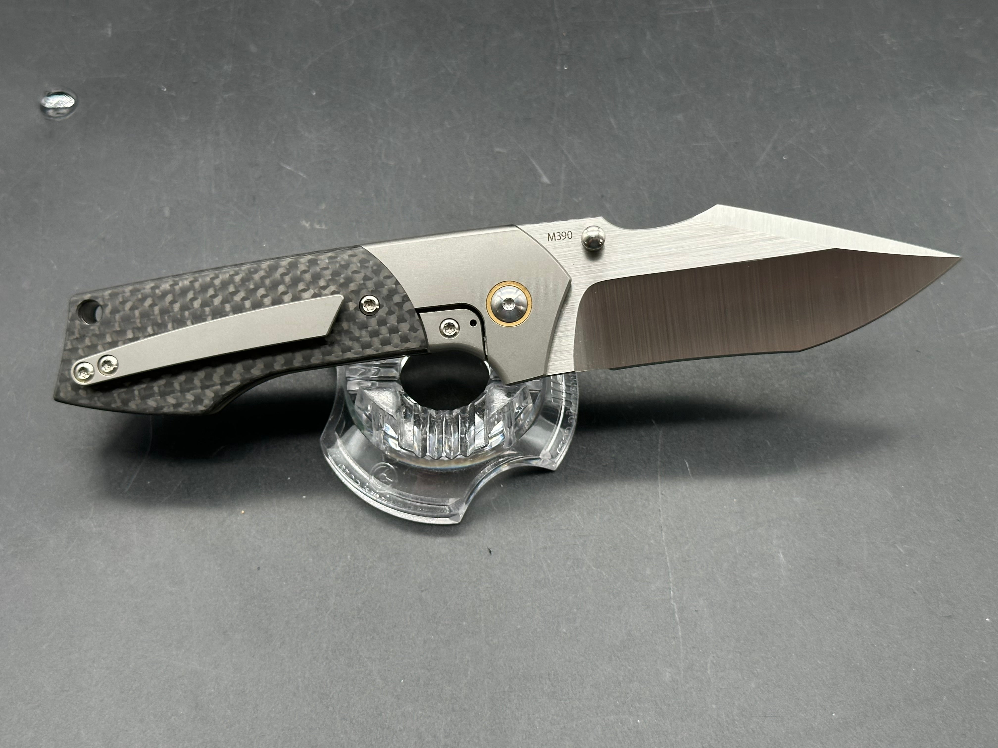 Burchtree Designs Secant Michael Burch design. 3.125 inch satin Bohler M390 blade. Titanium and carbon fiber frame