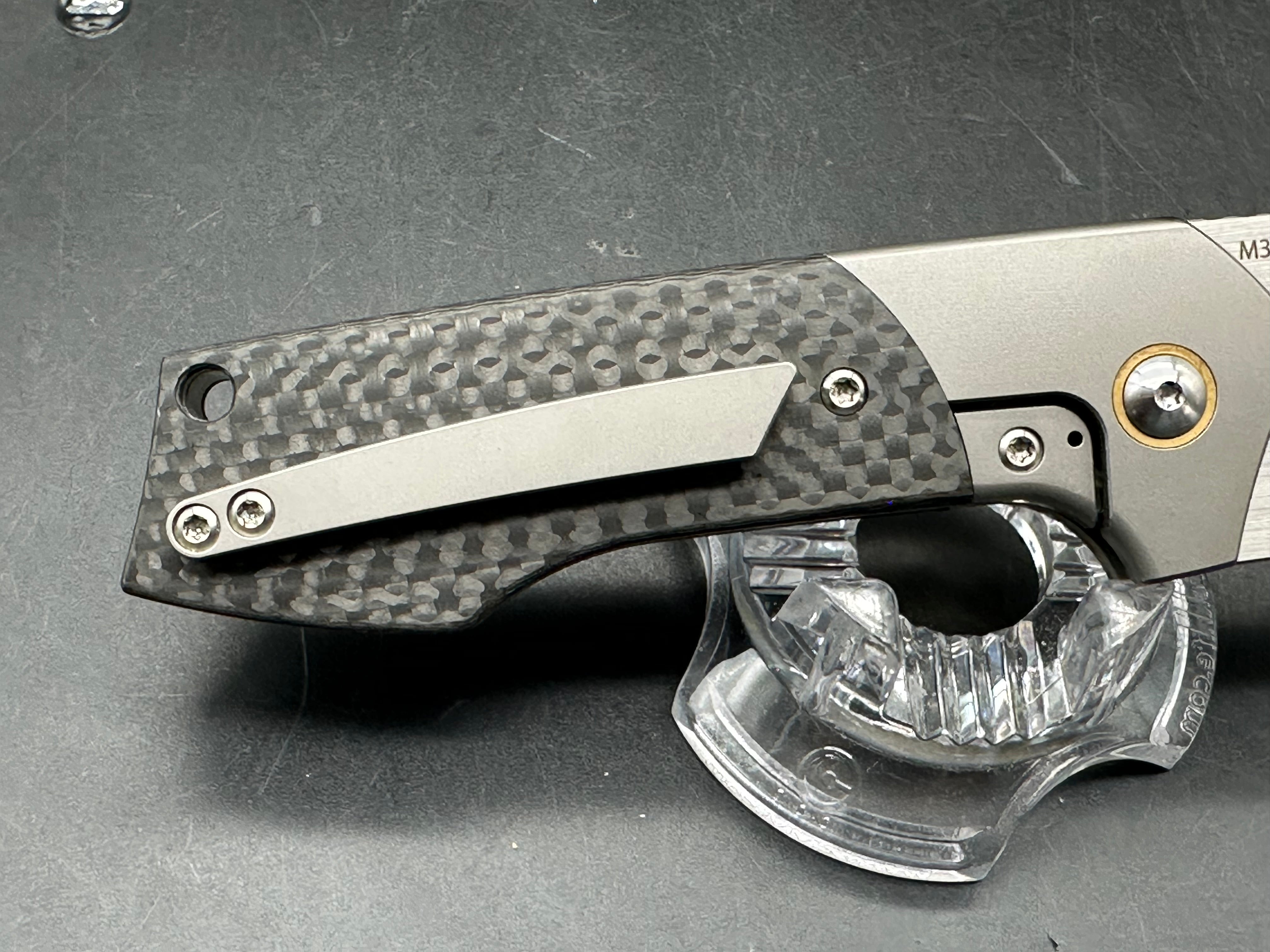 Burchtree Designs Secant Michael Burch design. 3.125 inch satin Bohler M390 blade. Titanium and carbon fiber frame