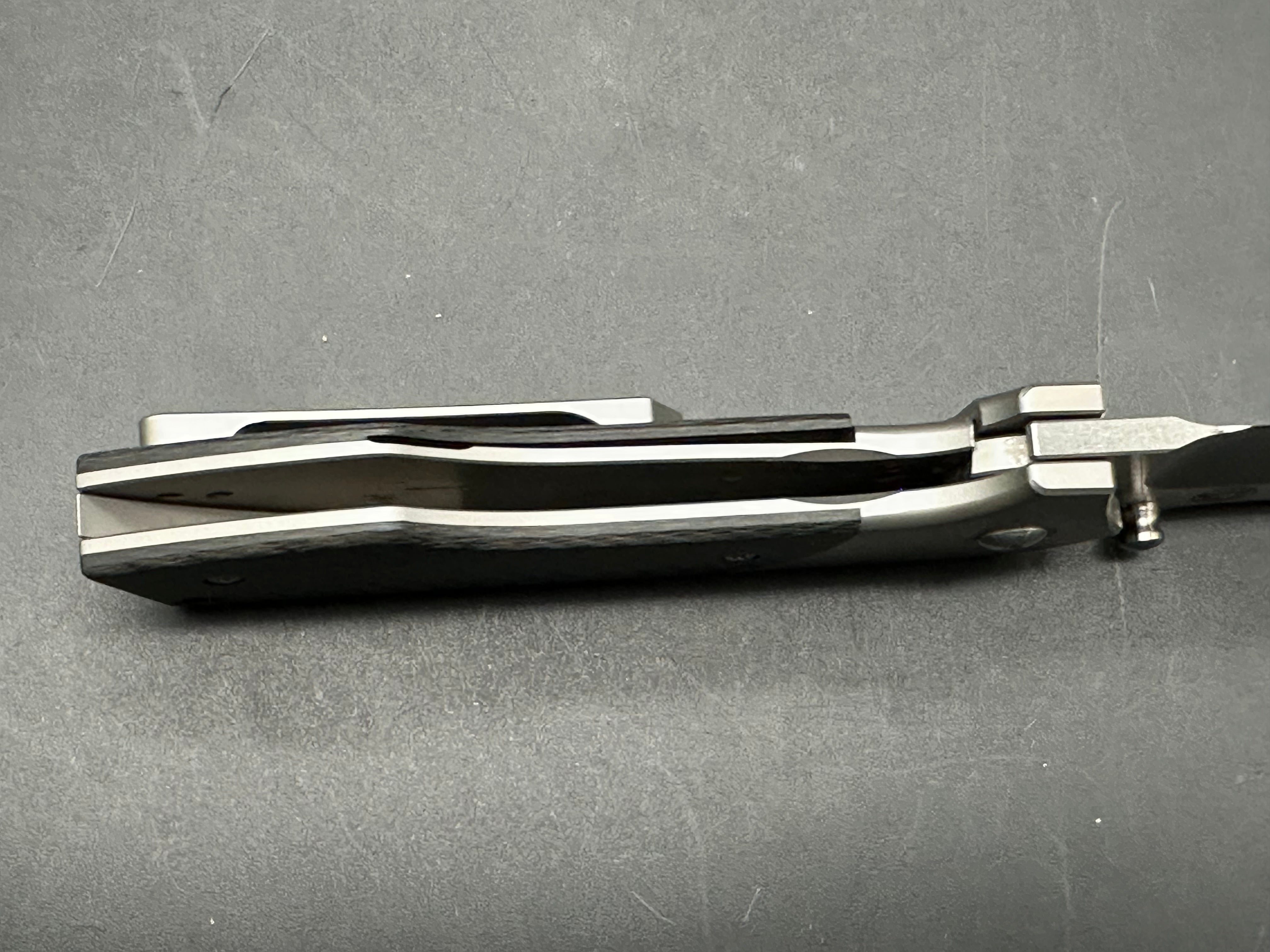 Burchtree Designs Secant Michael Burch design. 3.125 inch satin Bohler M390 blade. Titanium and carbon fiber frame