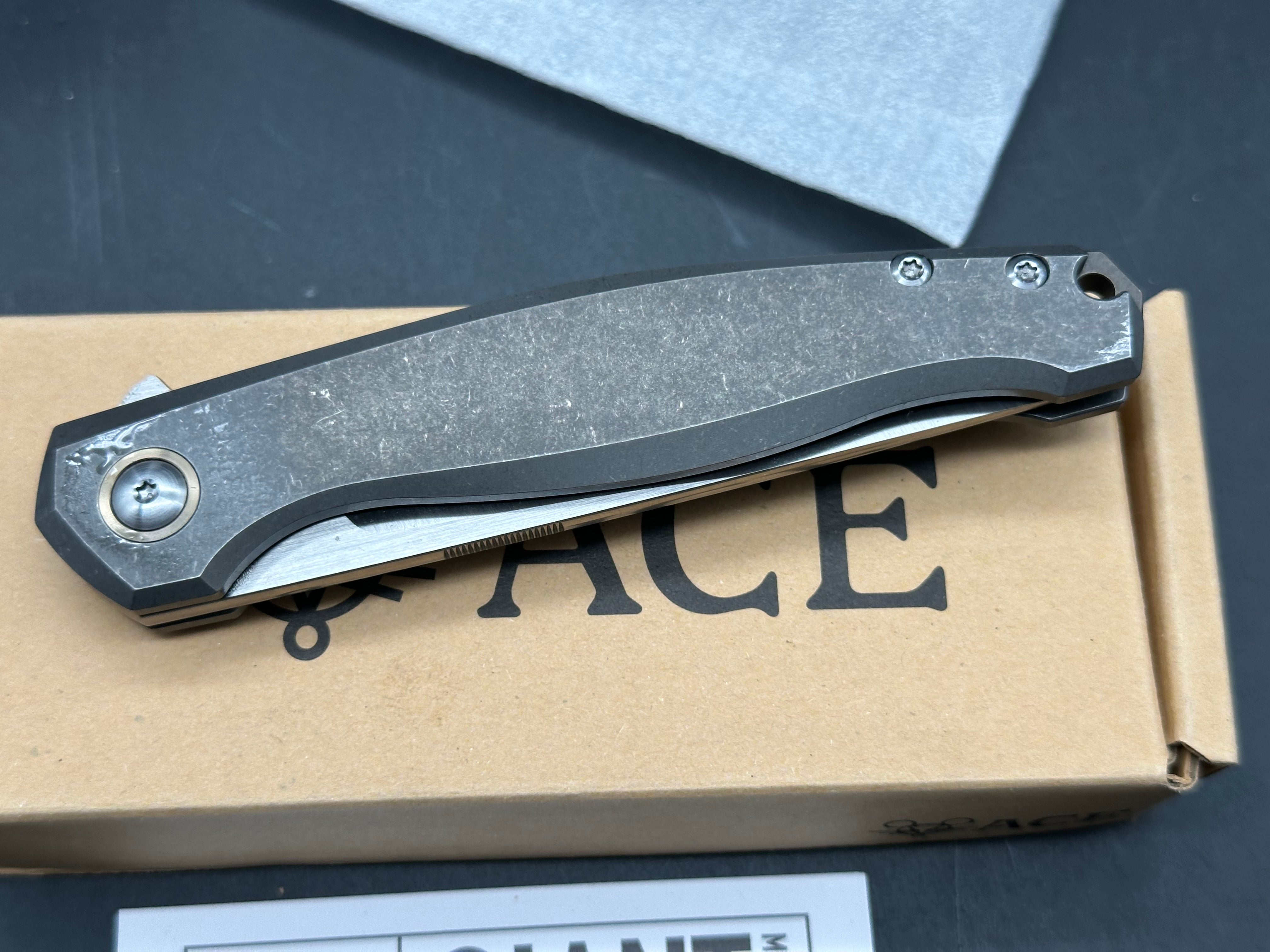 Giant Mouse Sonoma 3.5 inch satin, drop point M390 blade. Titanium stonewashed handles