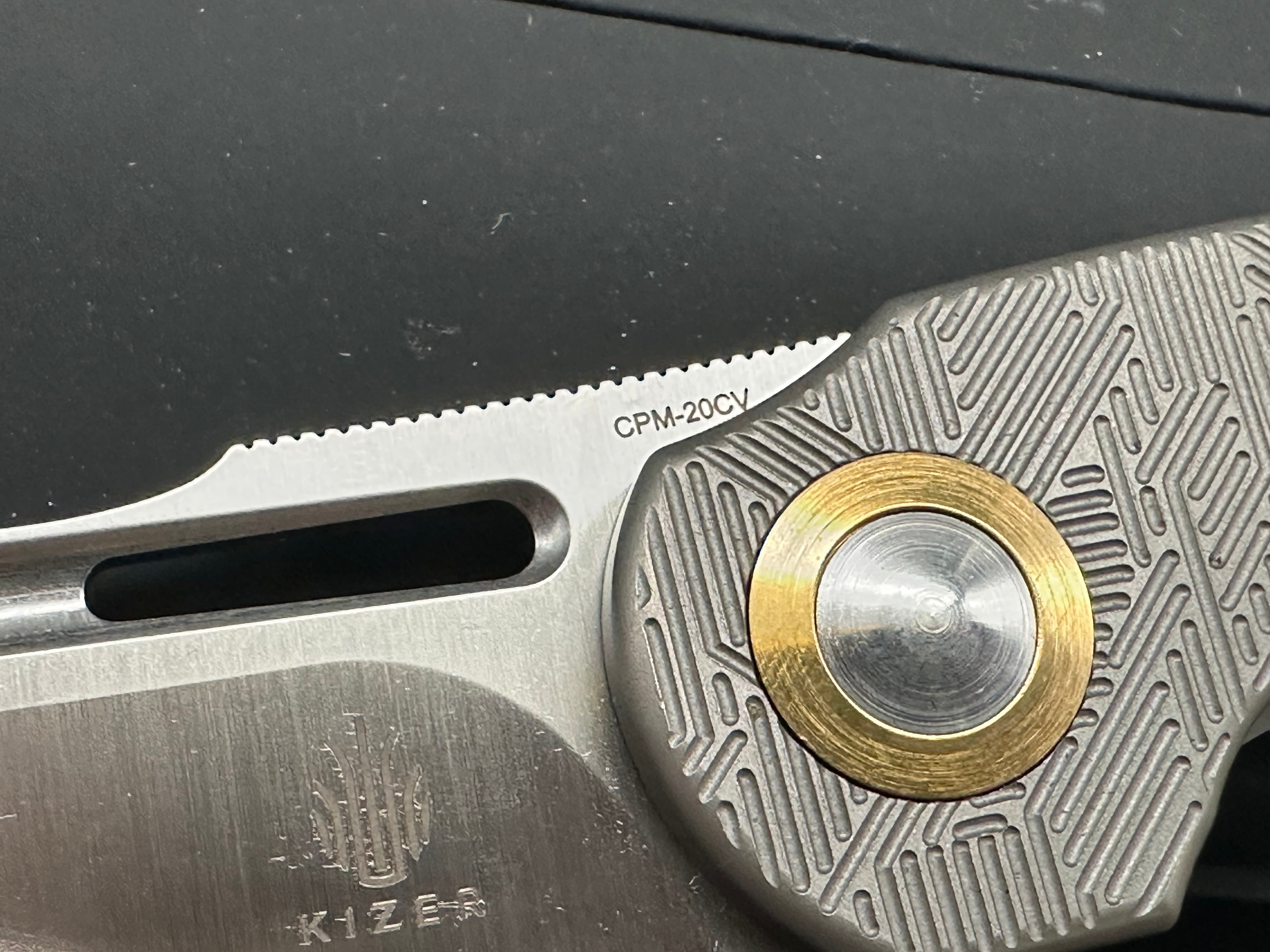 Kizer October titanium handle w/20CV blade