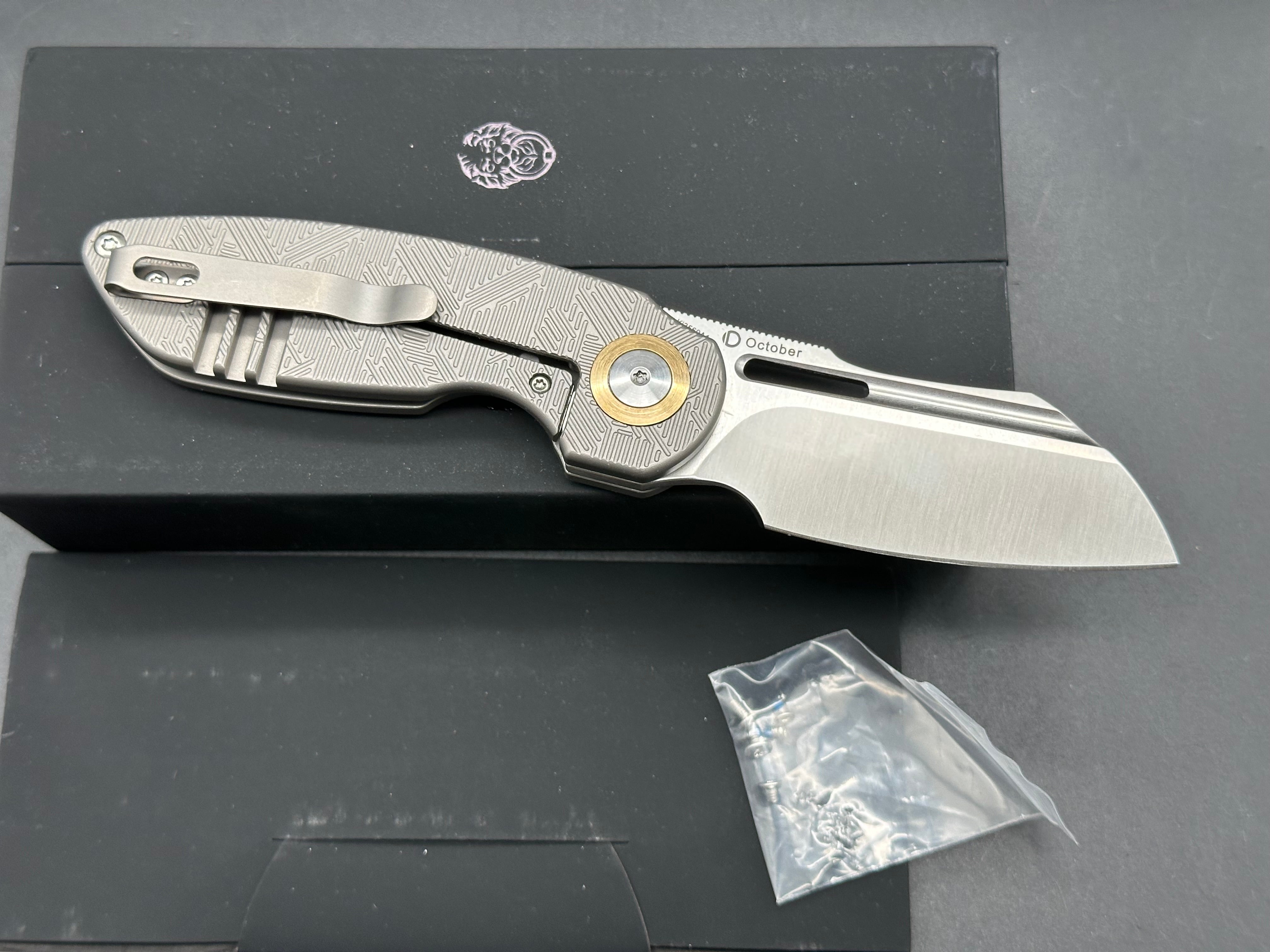 Kizer October titanium handle w/20CV blade