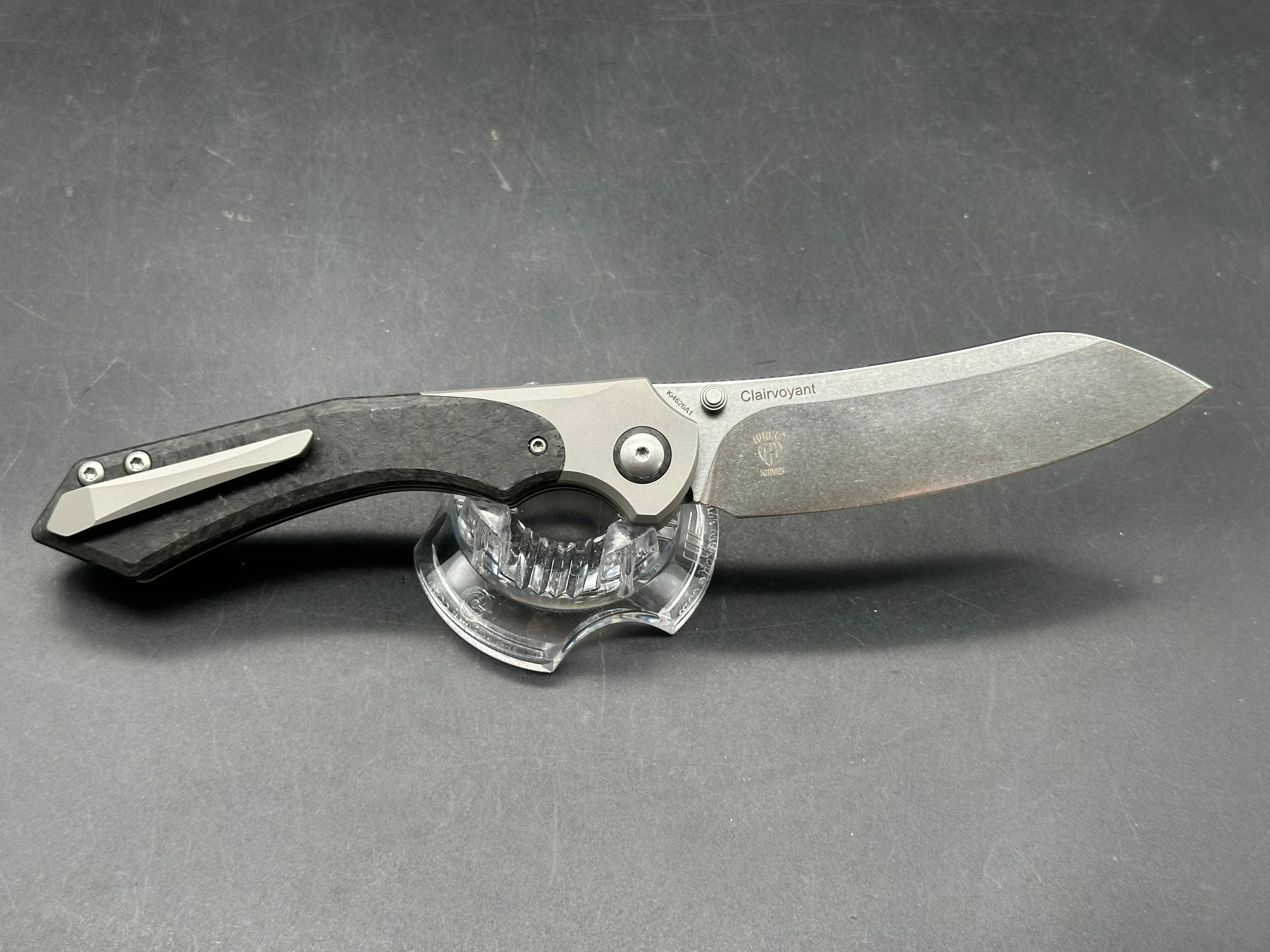 Kizer Clairvoyant 3.75 stonewashed, CPM-S35VN blade. Button lock. Titanium and carbon fiber scales