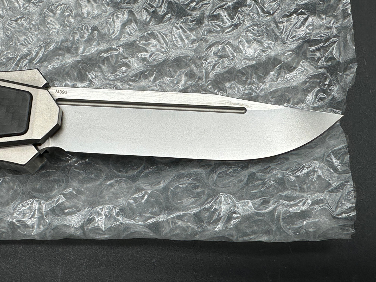 Remette Swordfish titanium handle w/M390 blade