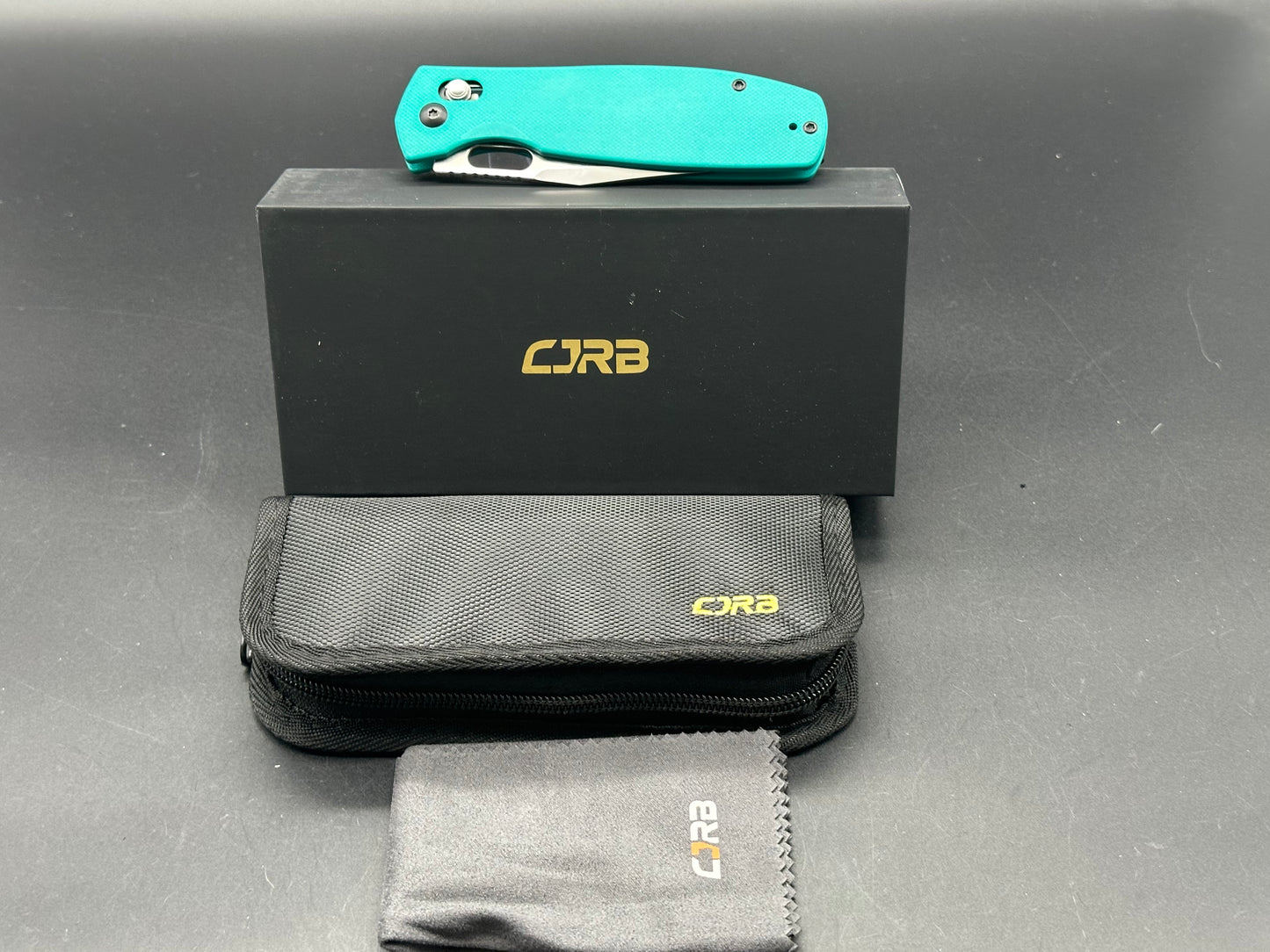 CJRB PRADO FOLDING KNIFE AQUA GREEN G10 HANDLE AR-RPM9 PLAIN EDGE SATIN FINISH