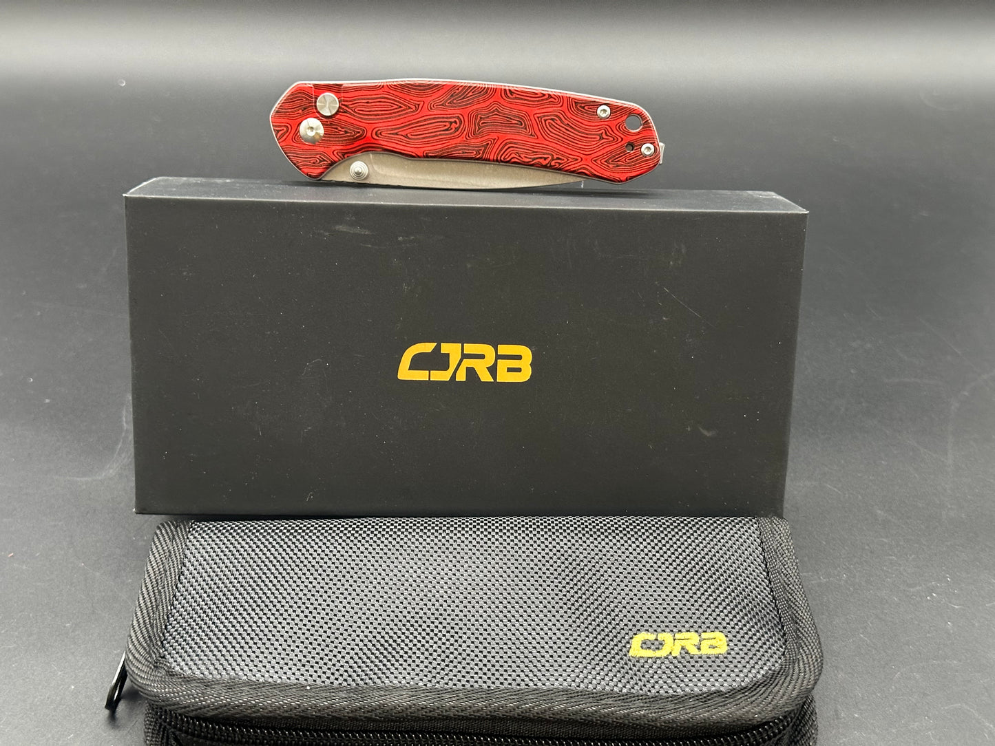 CJRB PYRITE (WMK EXCLUSIVE) BLACK & RED GMASCUS G10 HANDLE AR-RPM9 DROP POINT PLAIN EDGE STONEWASH FINISH