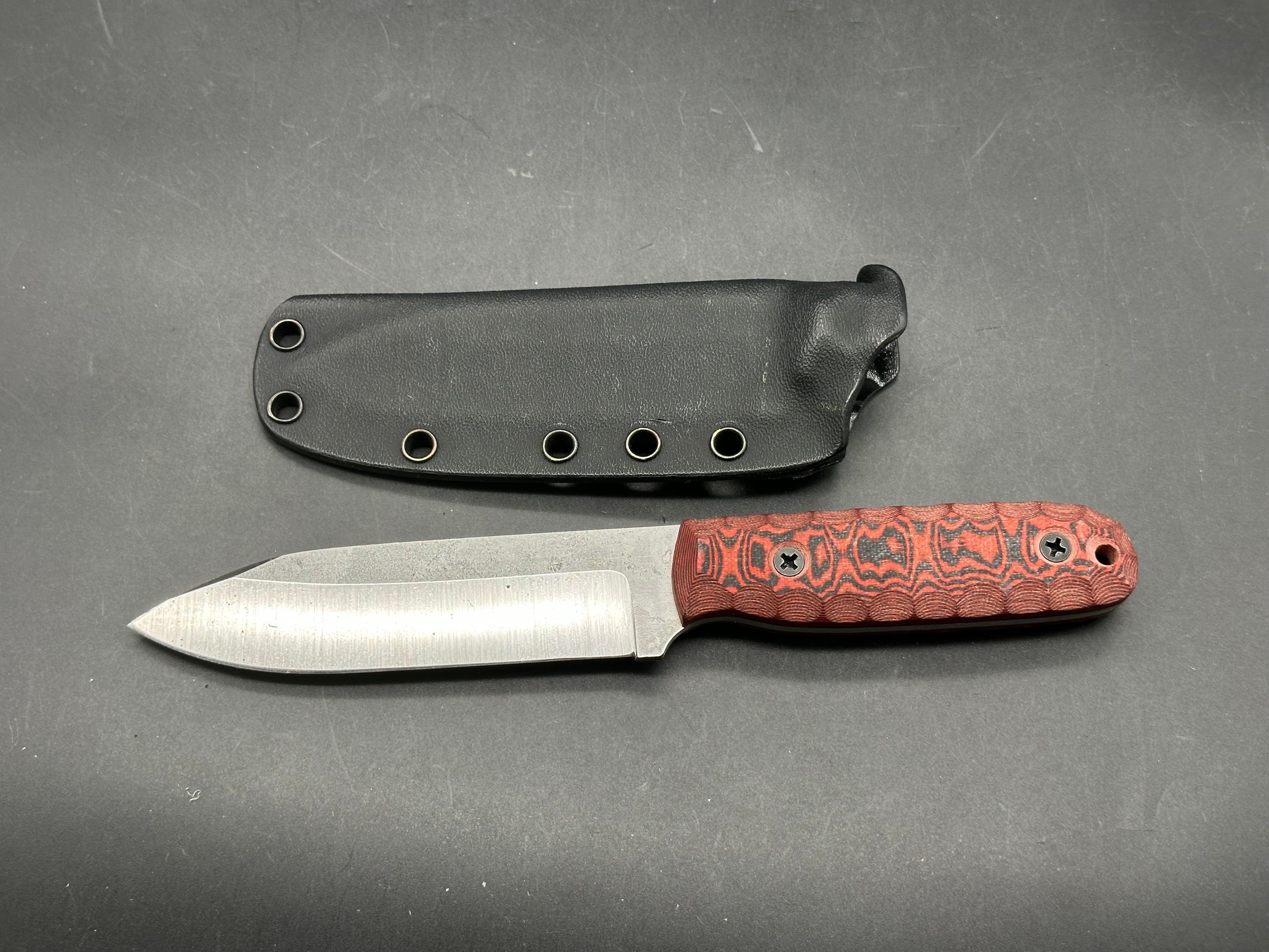 BGM Knives Kephart with black/red G-10 scales in 52100 steel