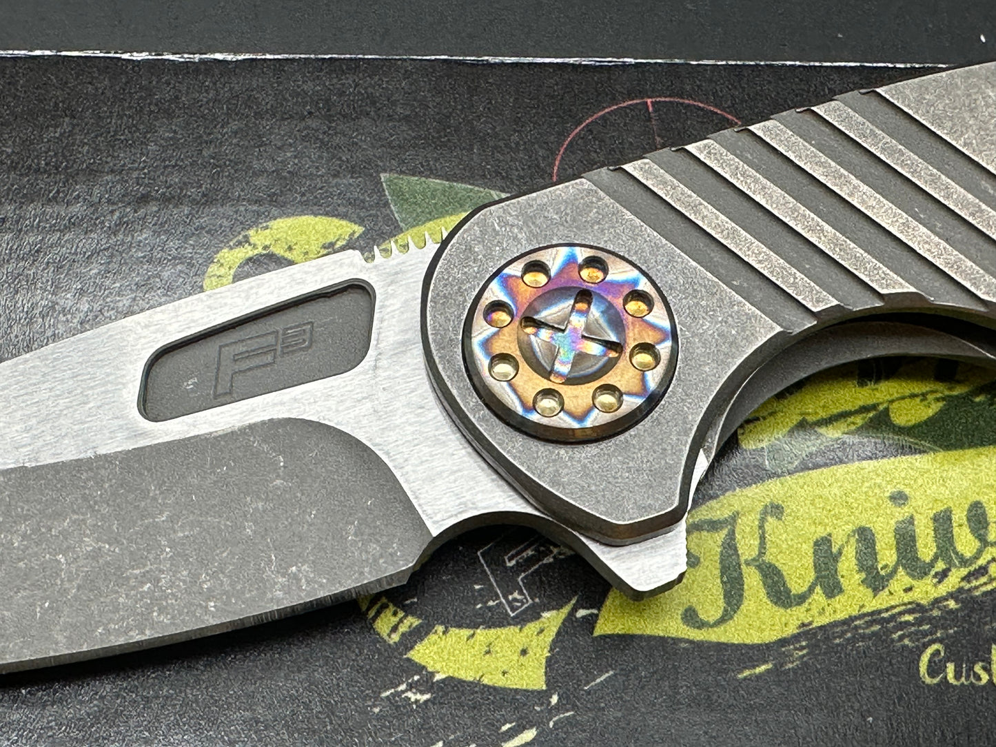 Curtiss F3 Medium Wharny flipper. Magnacut blade, titanium with polished bronzed hardware