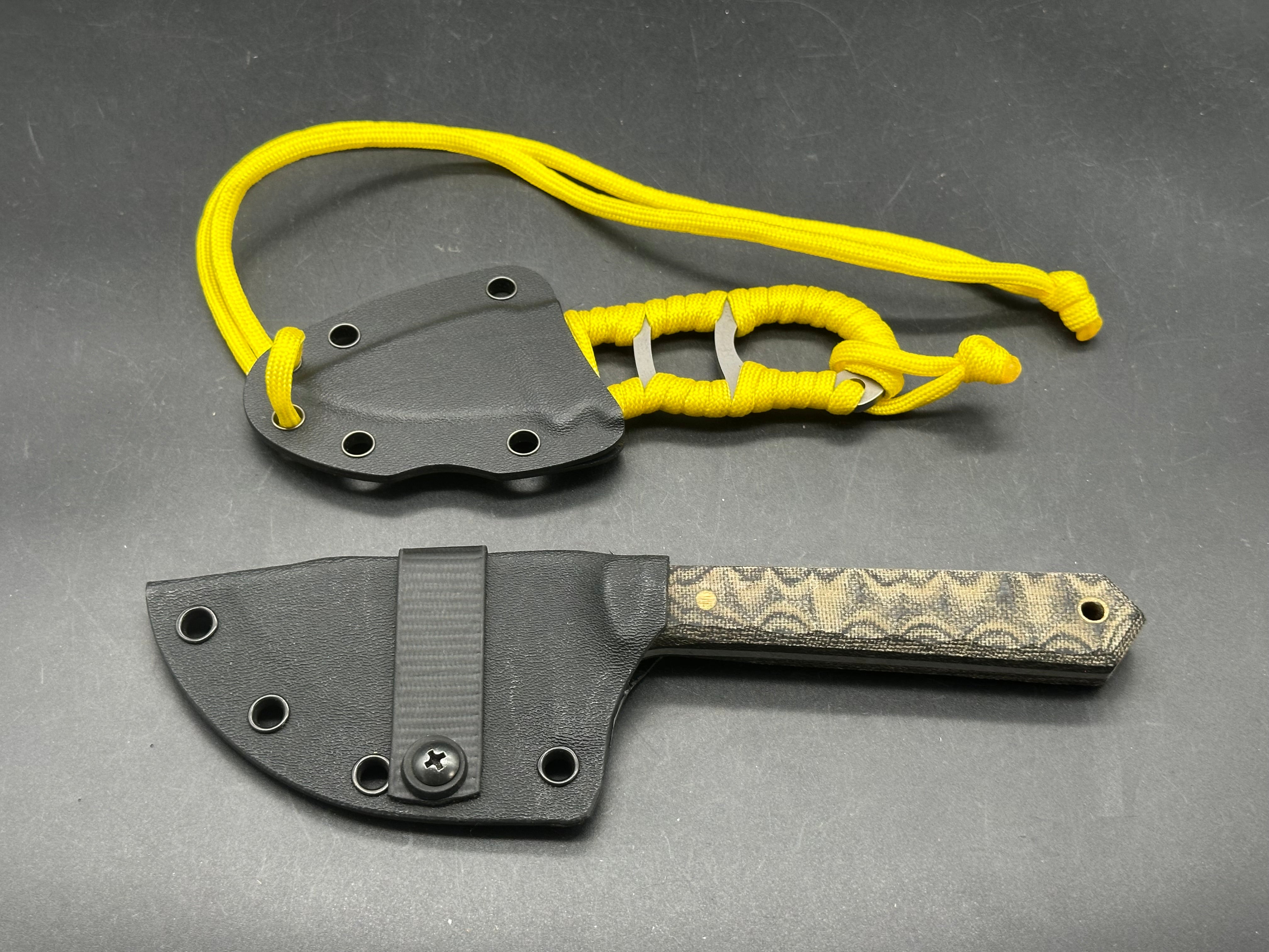 Charles Jones Blades Bonepicker in 3V steel with black micarta handles & Off Grid Knives All Day Fixie Neck knife in D2