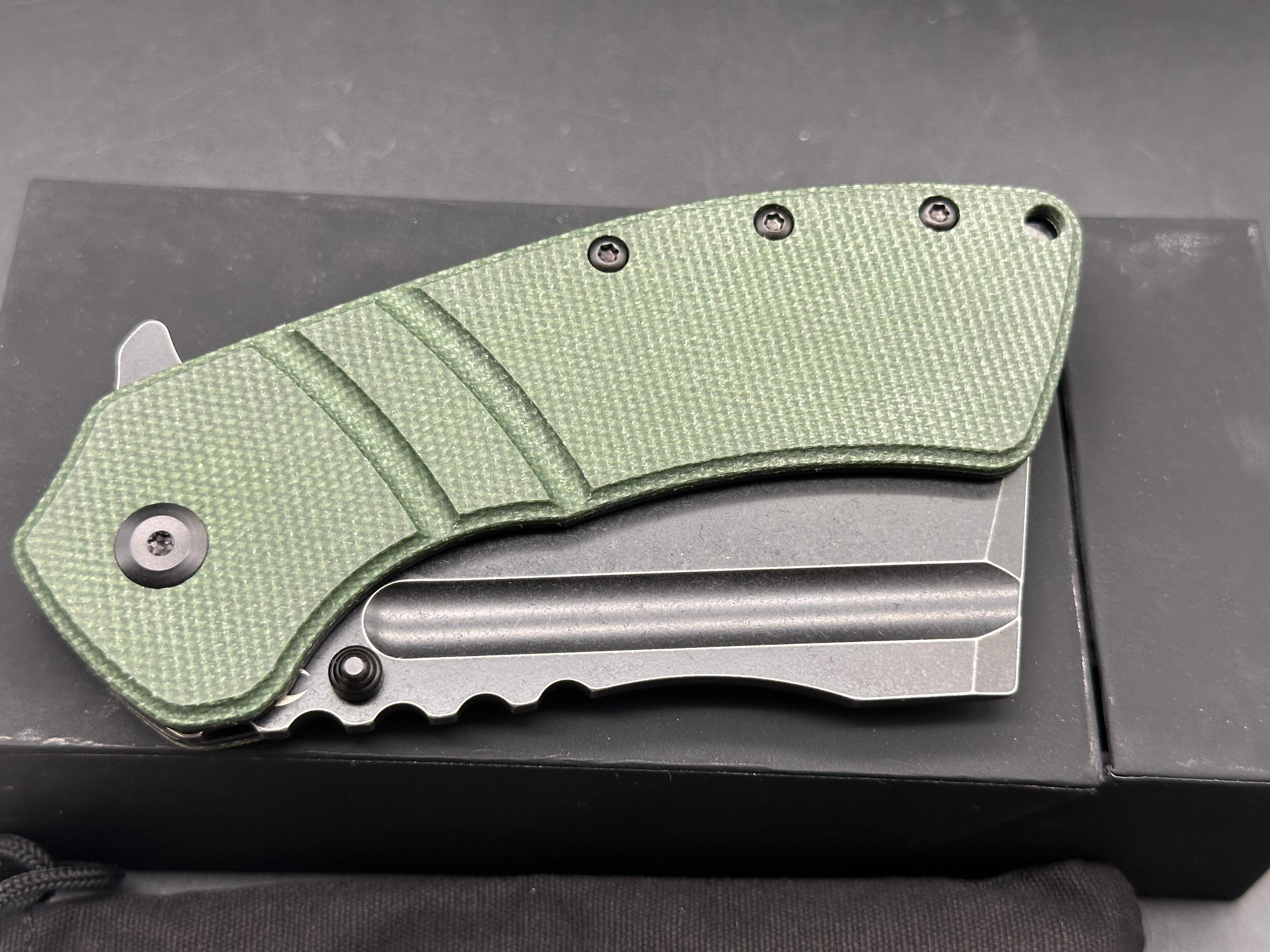 Kansept Korvid XL Green Micarta scales w/154CM blade
