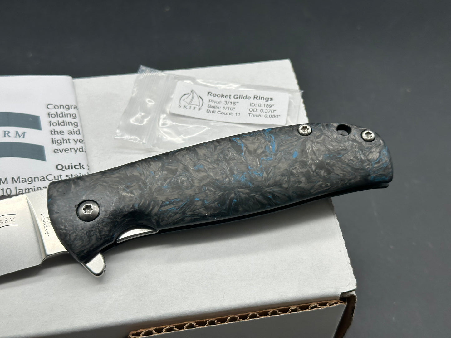 North Arm Skaha II, 3.34” Polished Stonewash MagnaCut Drop Point Blade with Blue Dark Matter Fat Carbon Handle (Serial #3154)