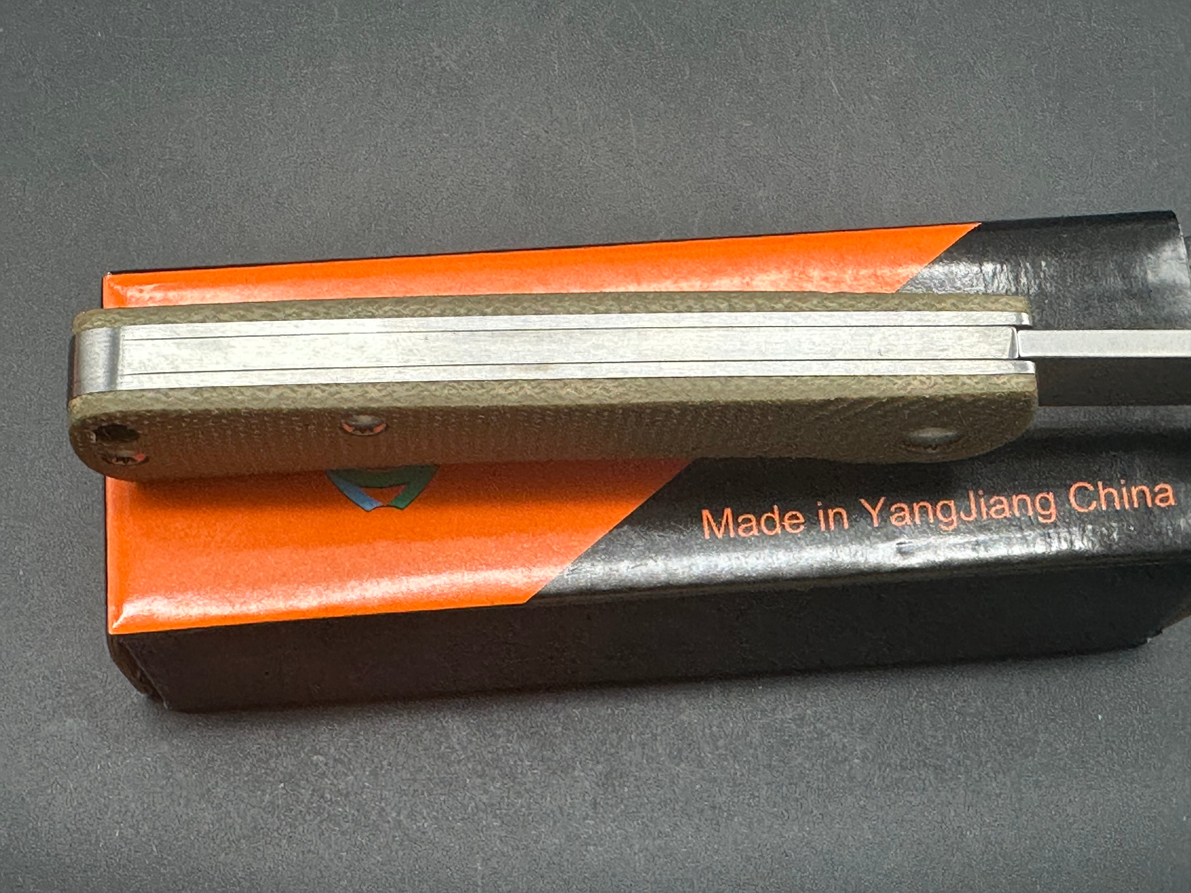 Sixleaf SL-07  slip joint, green micarta scales, D2 blade