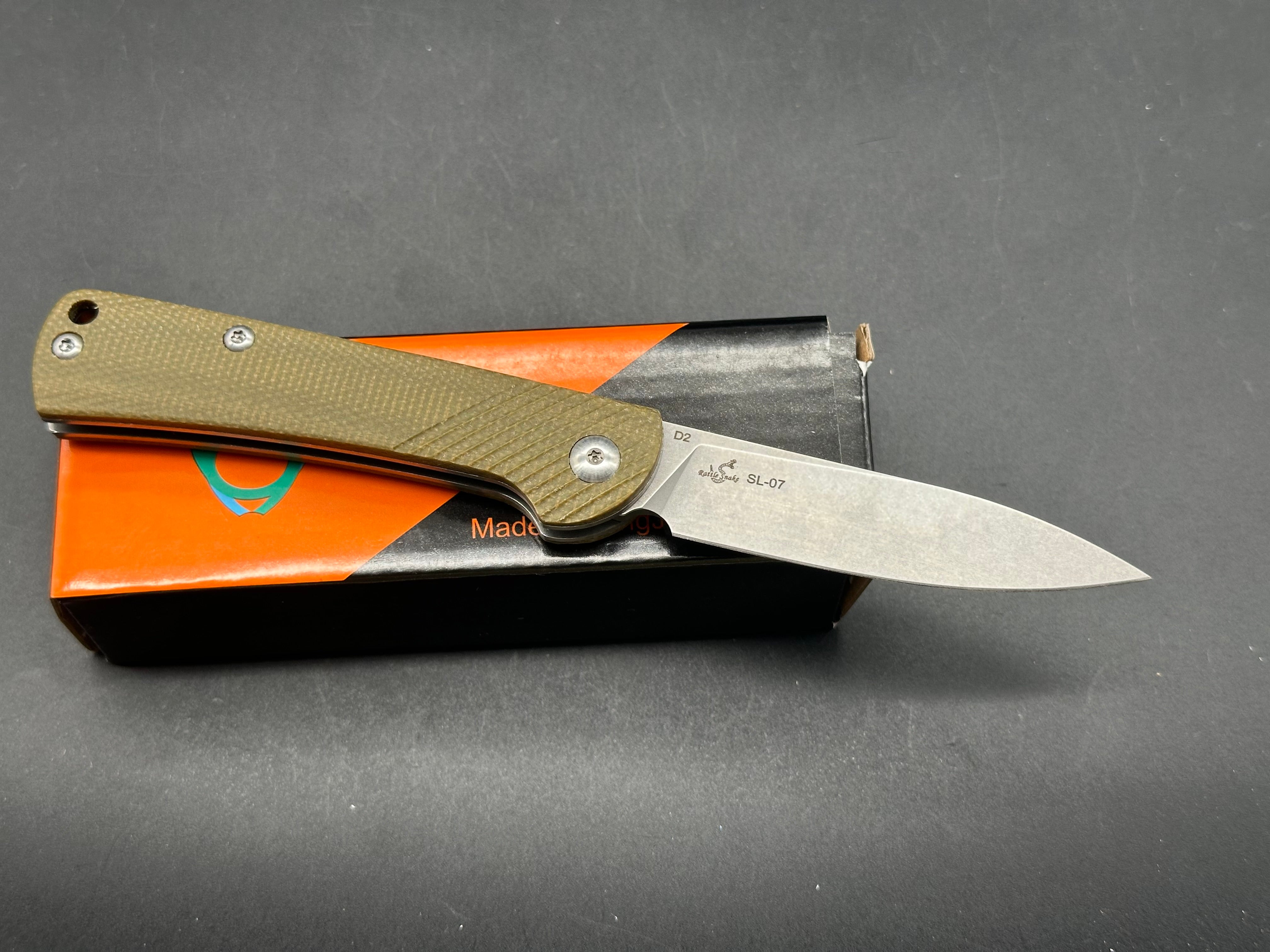 Sixleaf SL-07  slip joint, green micarta scales, D2 blade