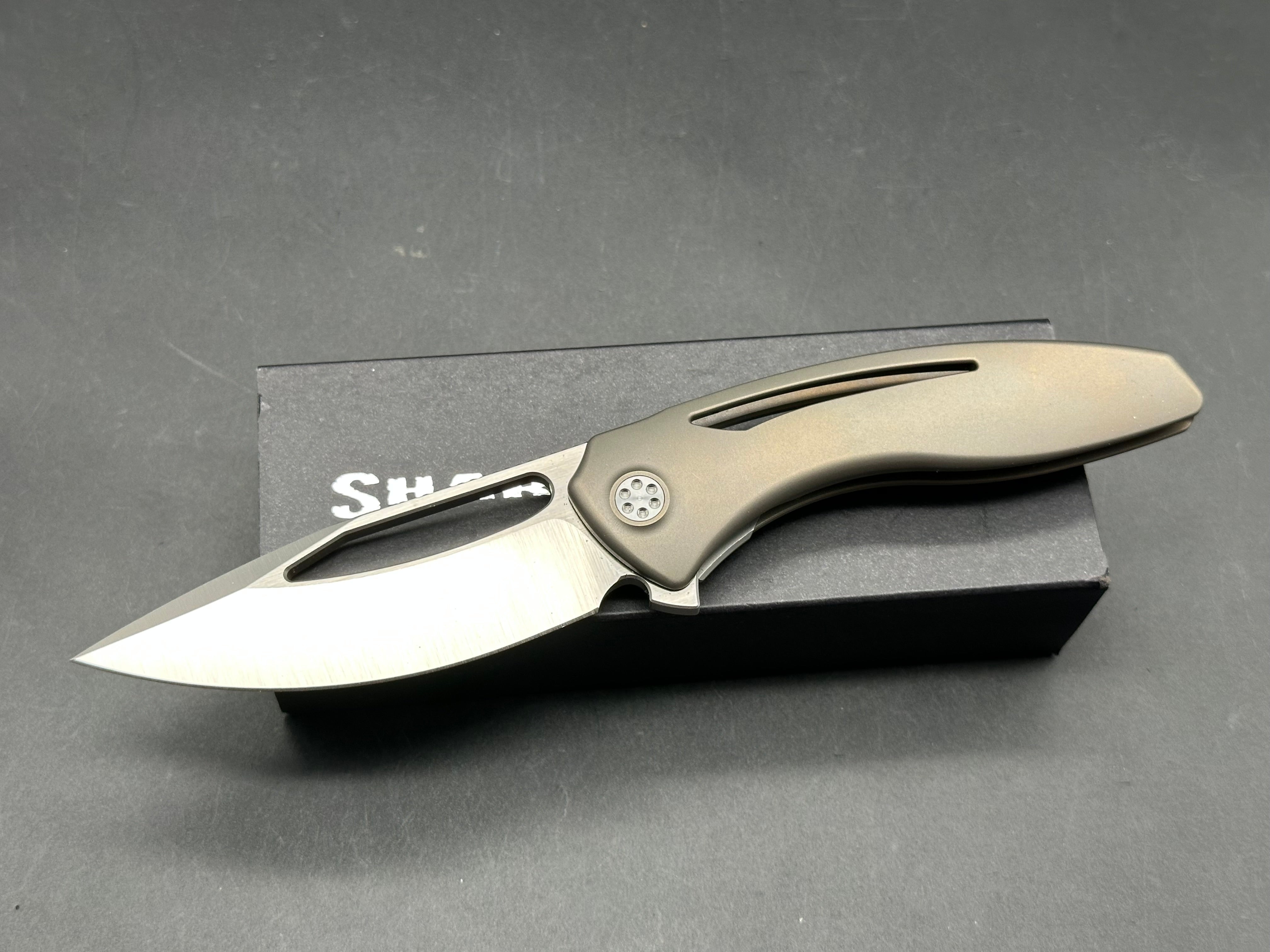 Sharp by Design Void Bronze titanium handle w/M390 blade