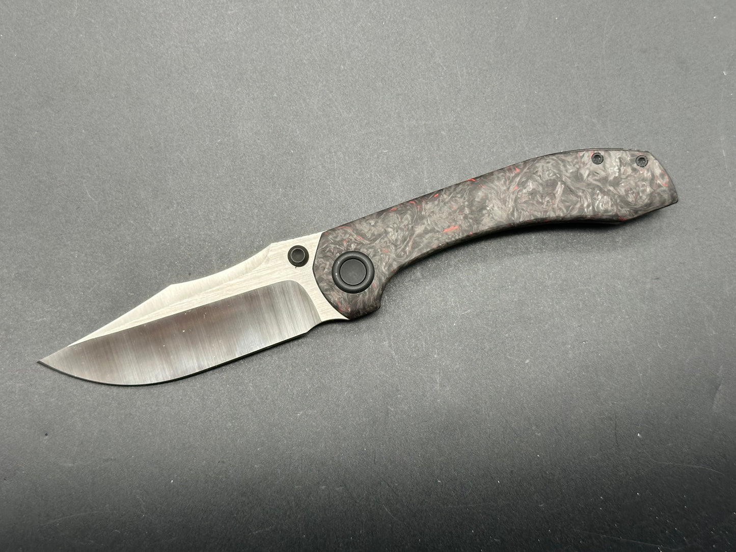 Brian Brown Raptor V2 (Reate) with black marble Carbon Fiber show scale