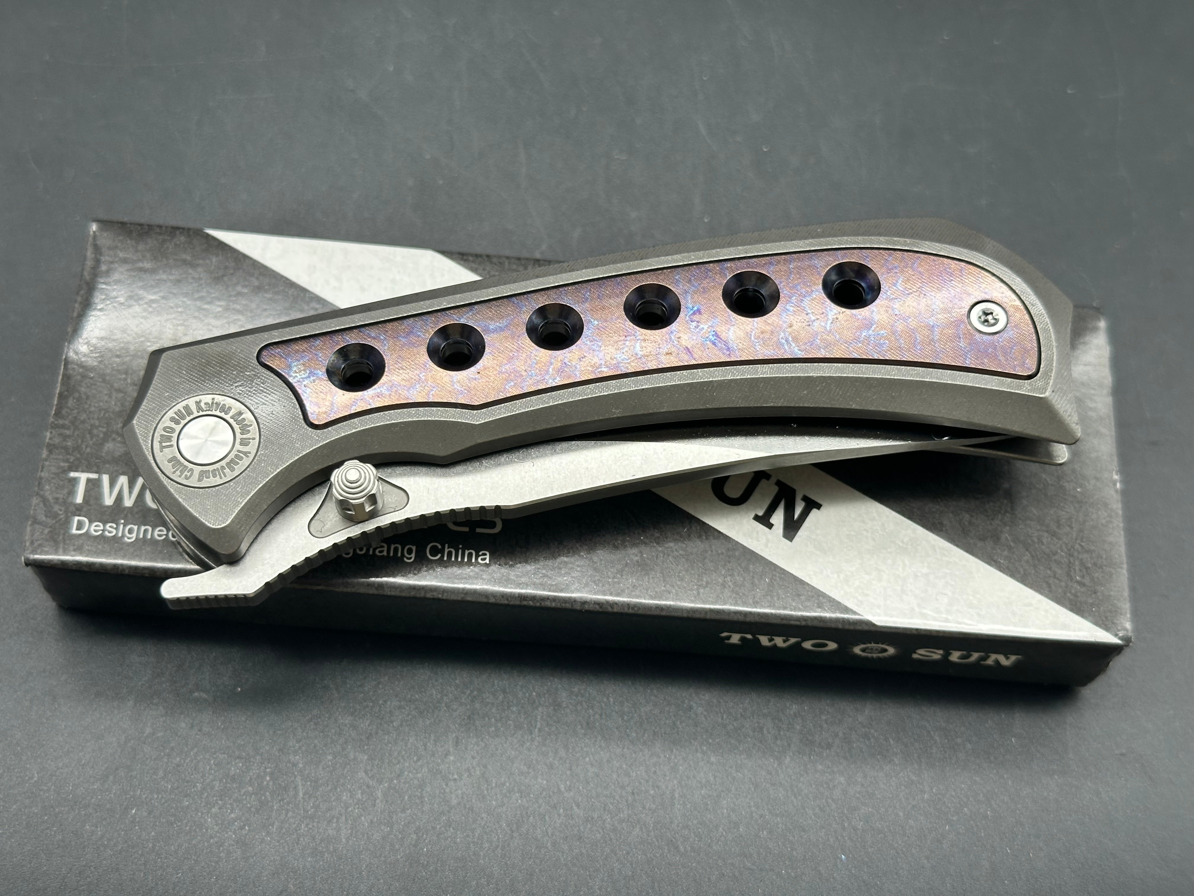 TwoSun TS400  Wong design, liner lock, titanium scales with anodized titanium inserts, D2 blade