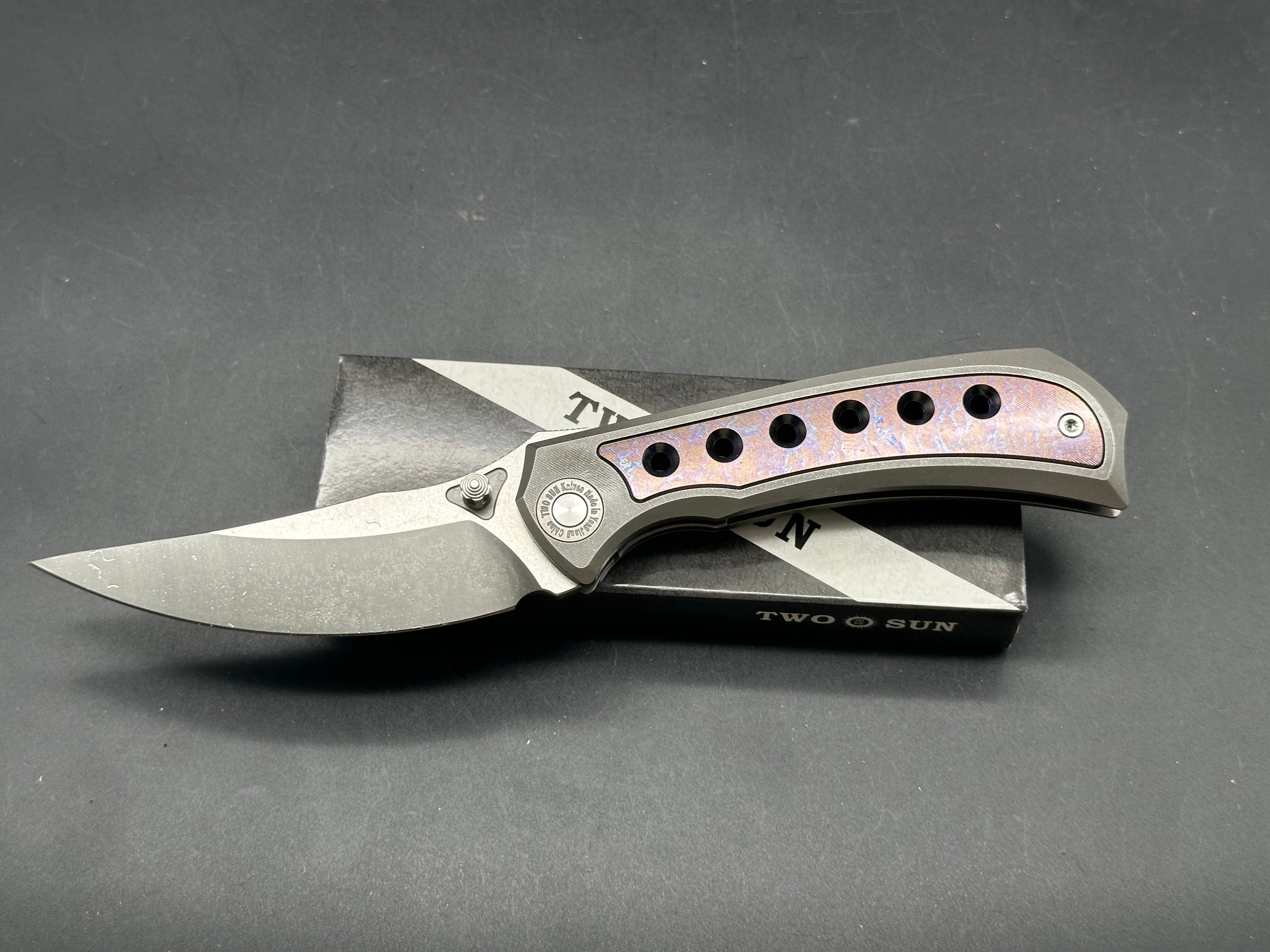 TwoSun TS400  Wong design, liner lock, titanium scales with anodized titanium inserts, D2 blade