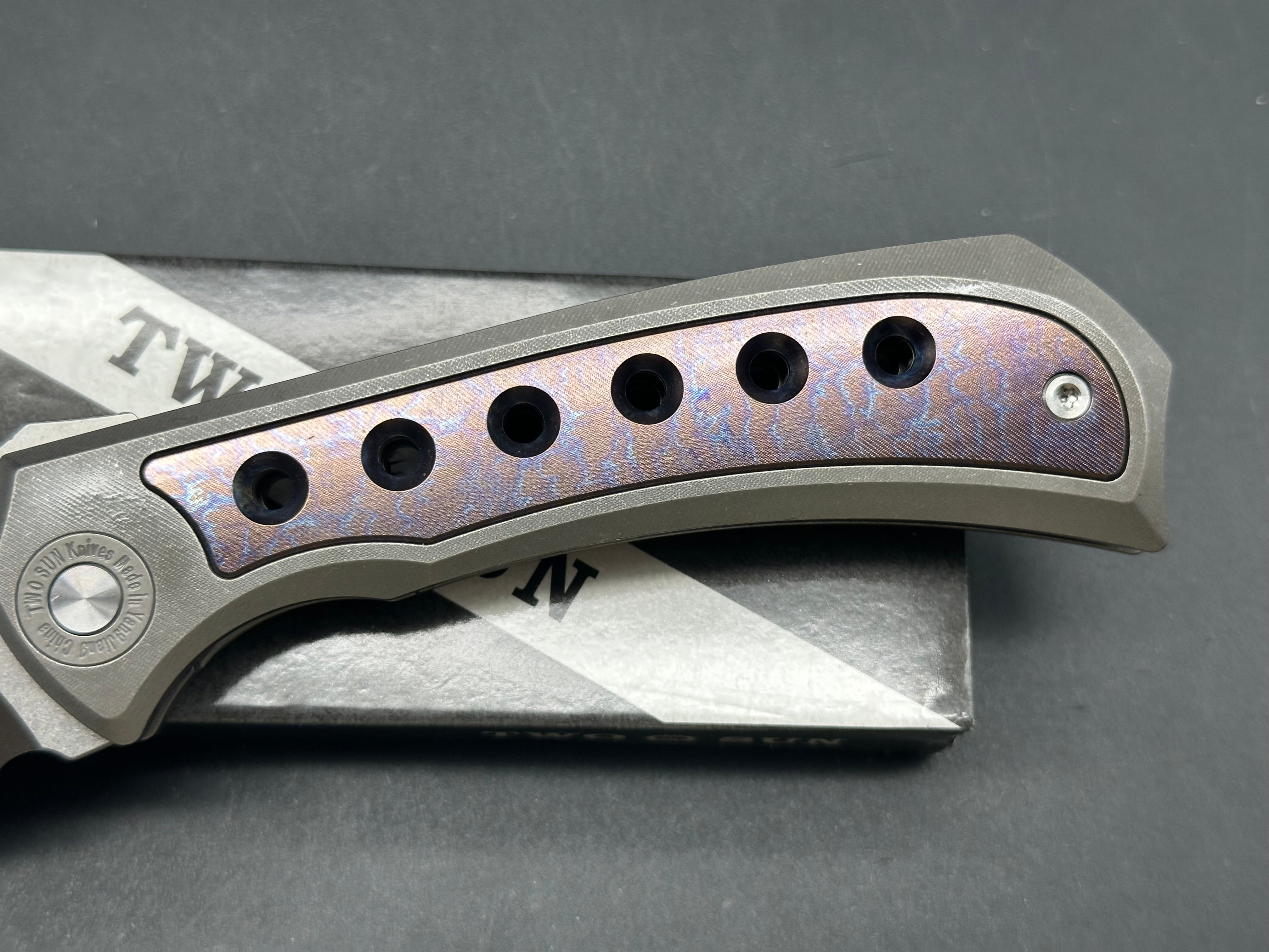 TwoSun TS400  Wong design, liner lock, titanium scales with anodized titanium inserts, D2 blade