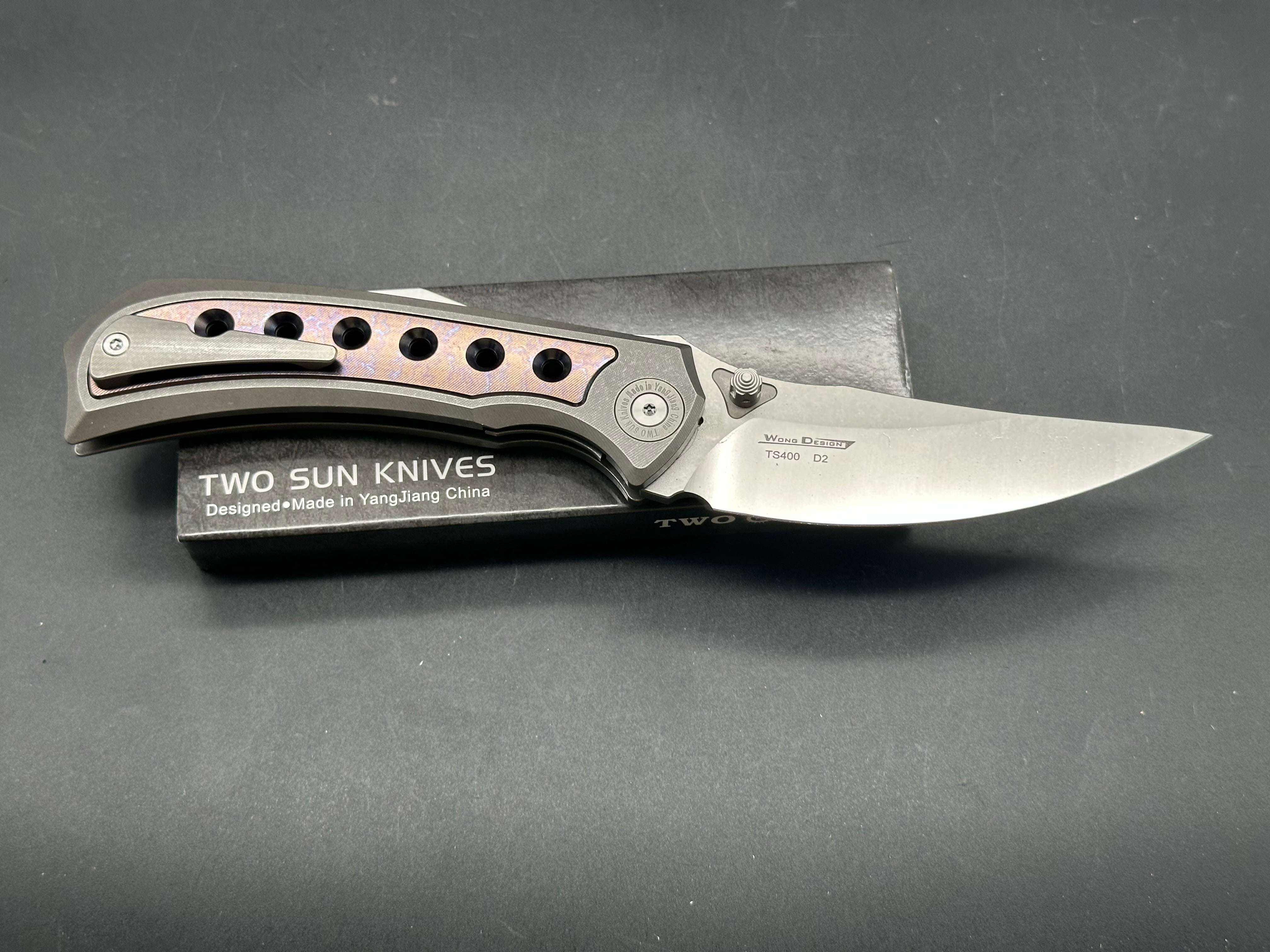 TwoSun TS400  Wong design, liner lock, titanium scales with anodized titanium inserts, D2 blade