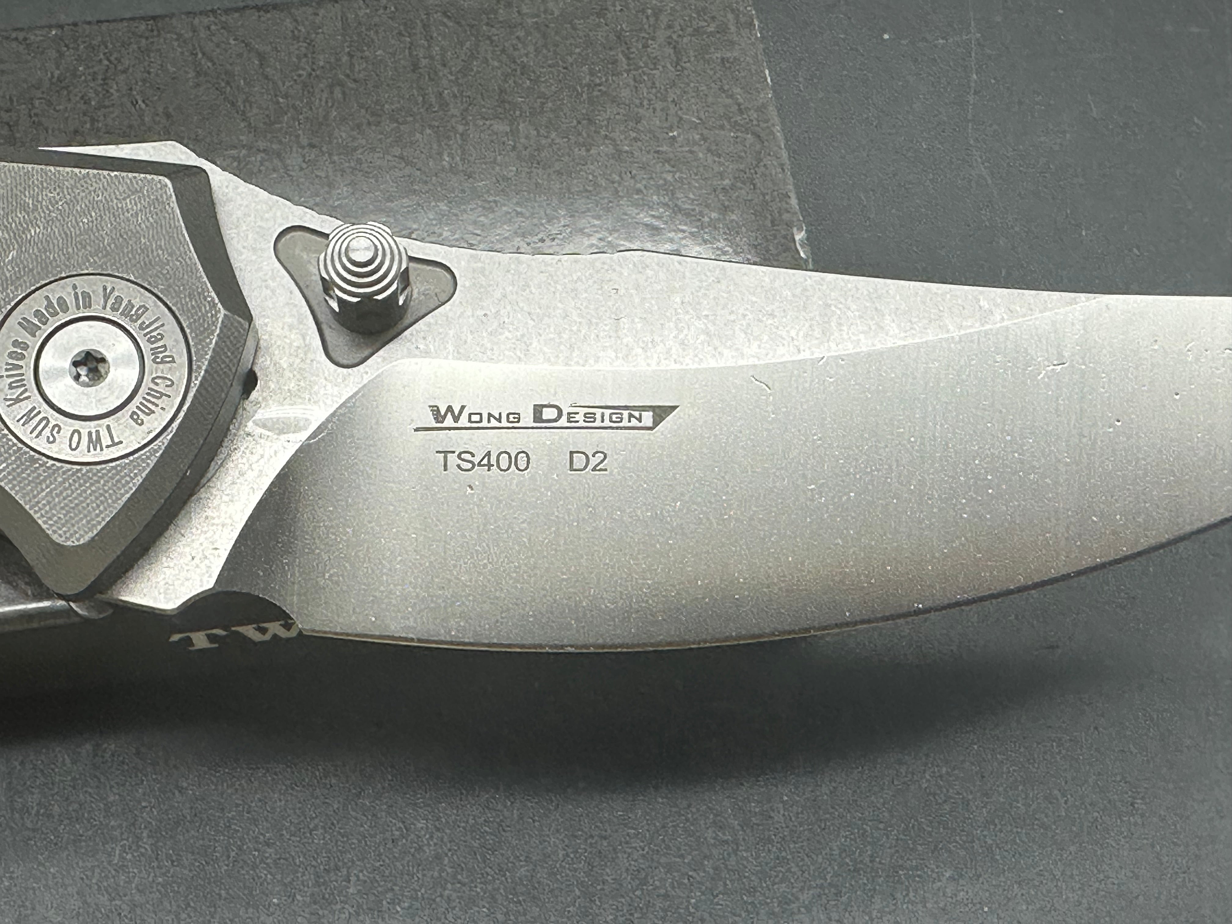 TwoSun TS400  Wong design, liner lock, titanium scales with anodized titanium inserts, D2 blade