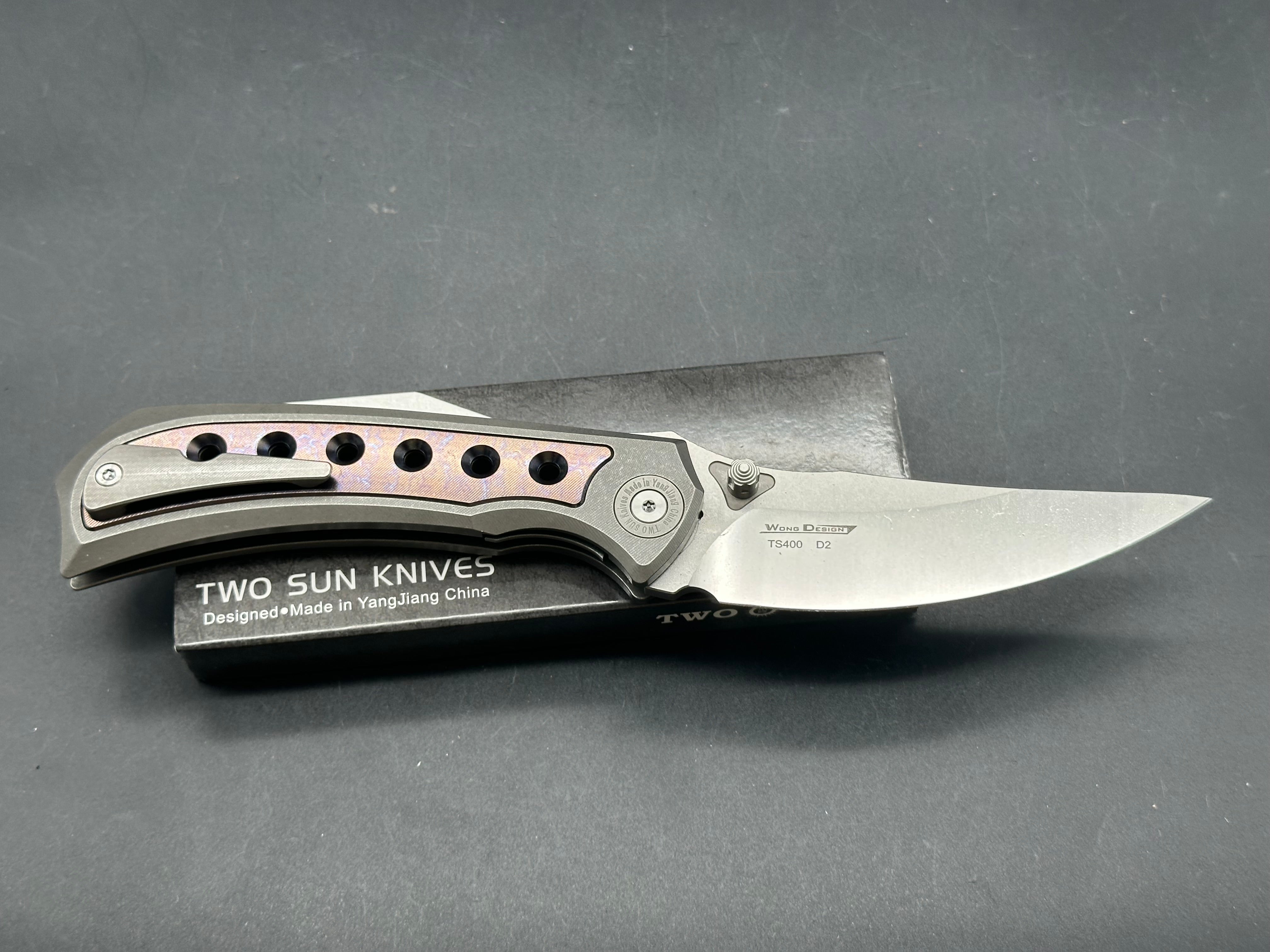 TwoSun TS400  Wong design, liner lock, titanium scales with anodized titanium inserts, D2 blade