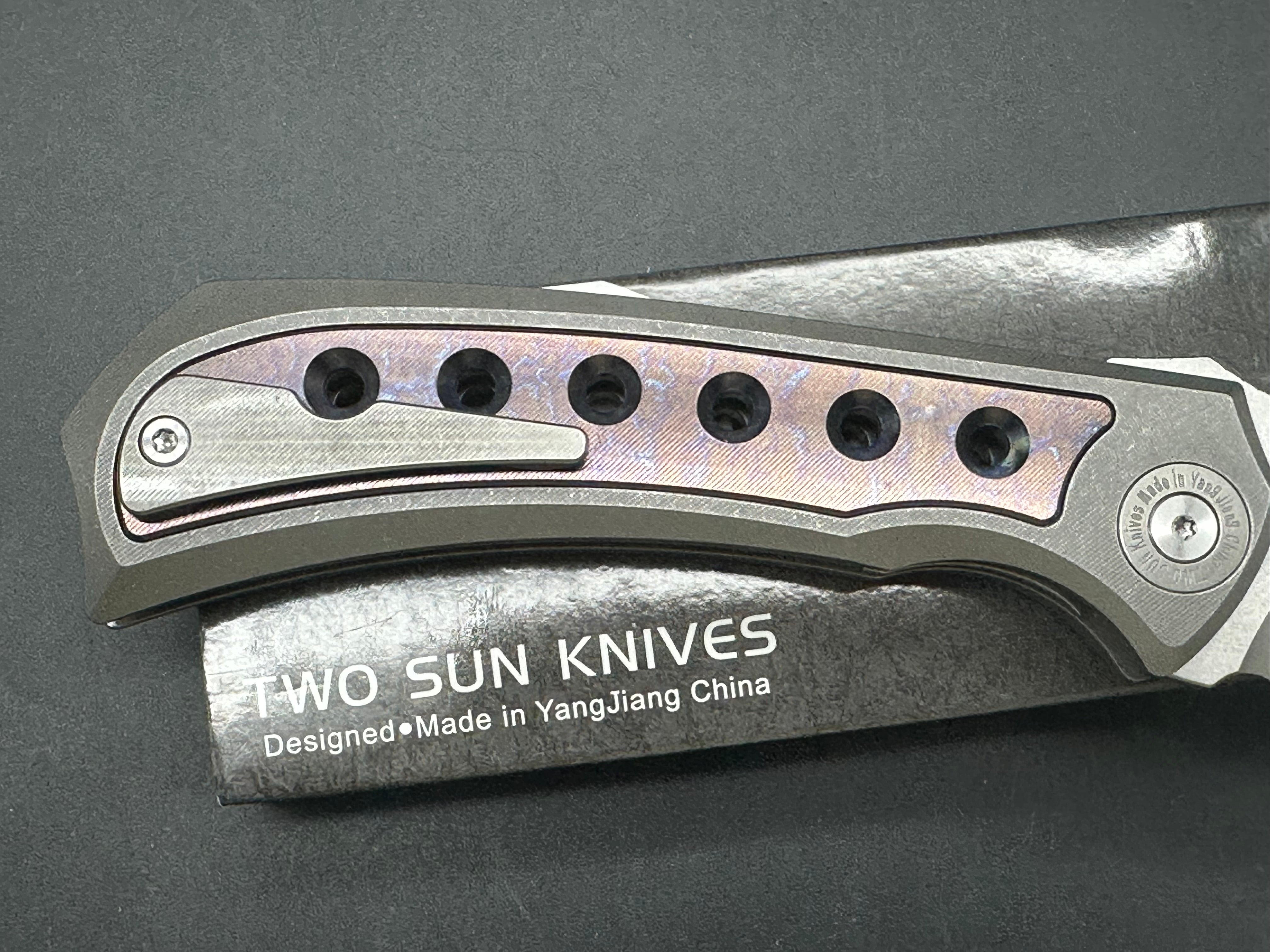 TwoSun TS400  Wong design, liner lock, titanium scales with anodized titanium inserts, D2 blade