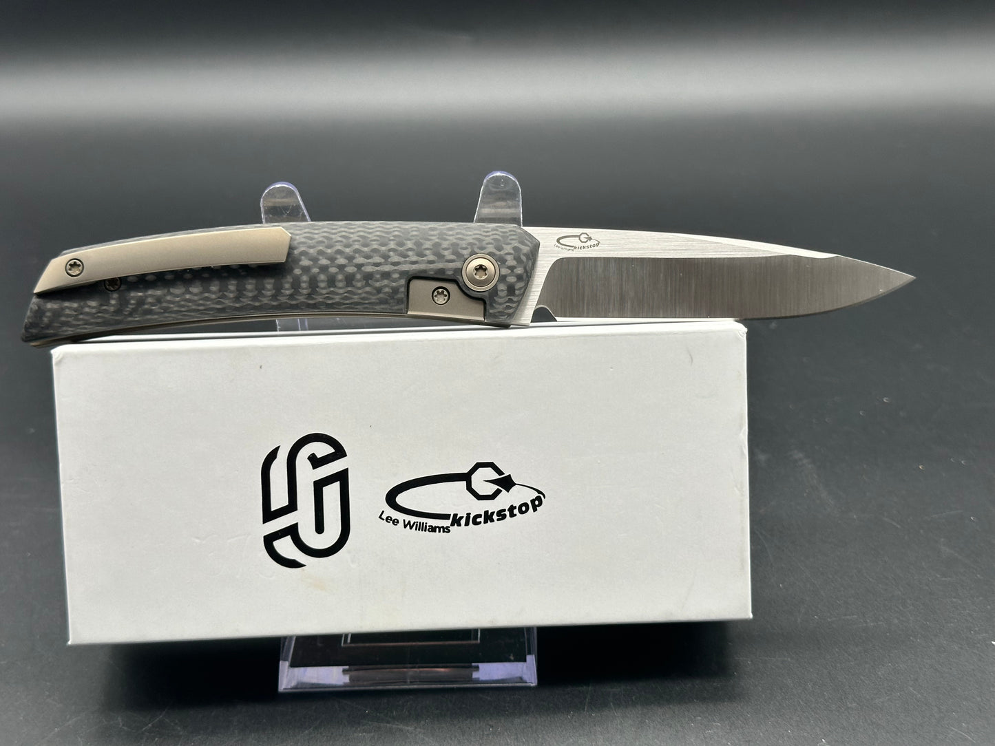 Jared Oeser F22 KickStop Flipper Knife M390 Machine Satin Blade Carbon Fiber Handles