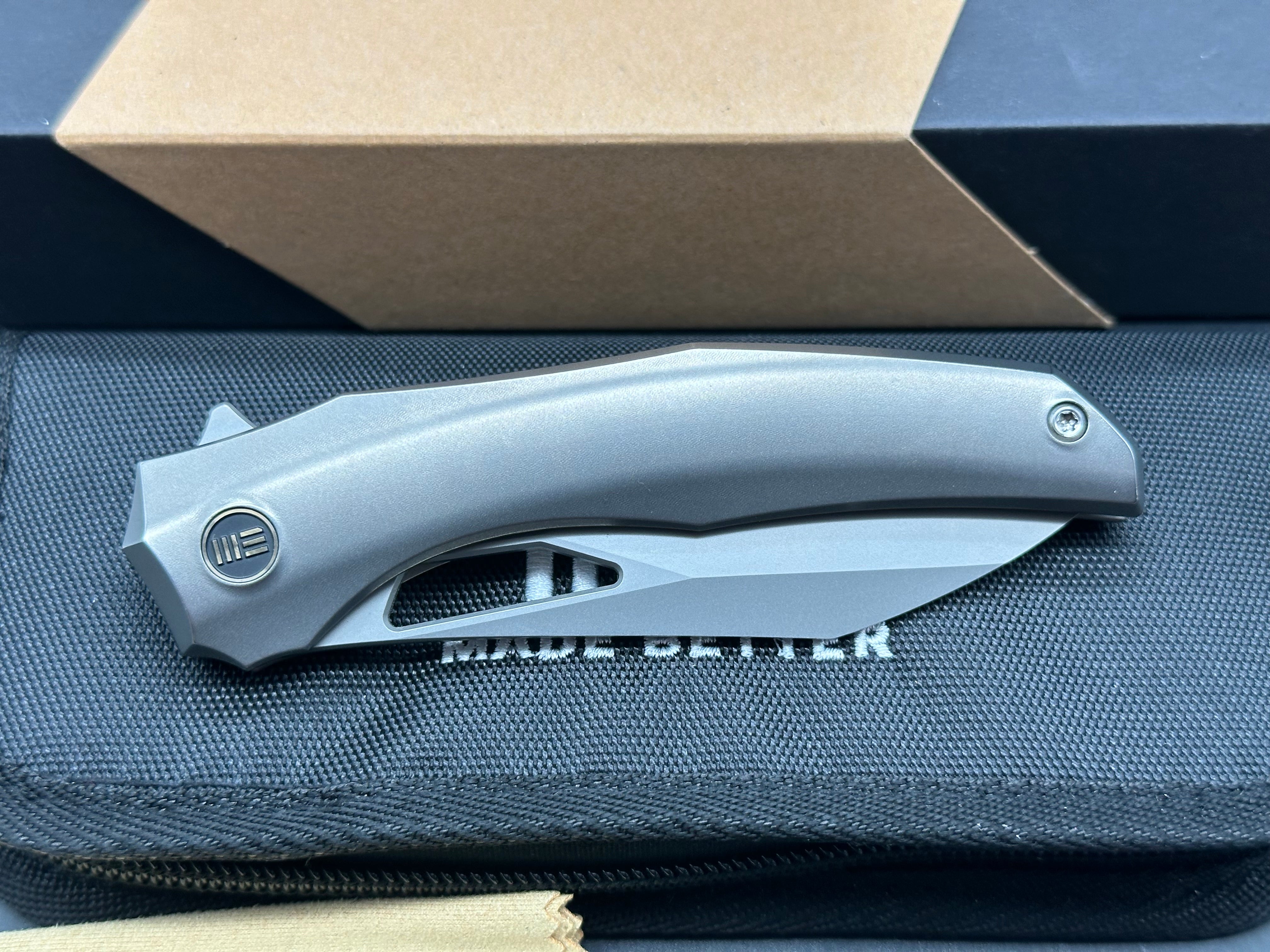 WE Knife Co. Ignio Polished Titanium 20CV blade Anodized clip