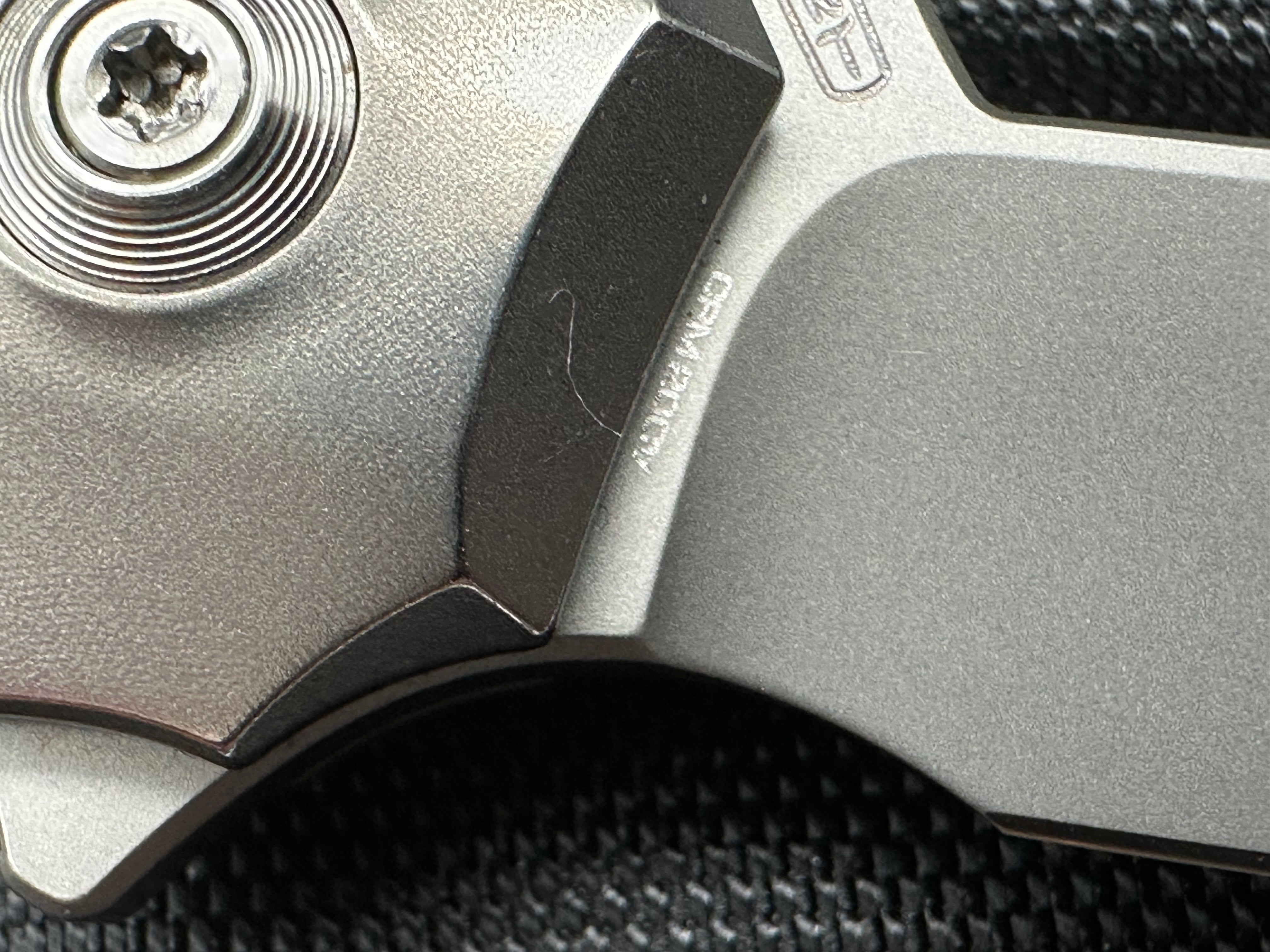 WE Knife Co. Ignio Polished Titanium 20CV blade Anodized clip