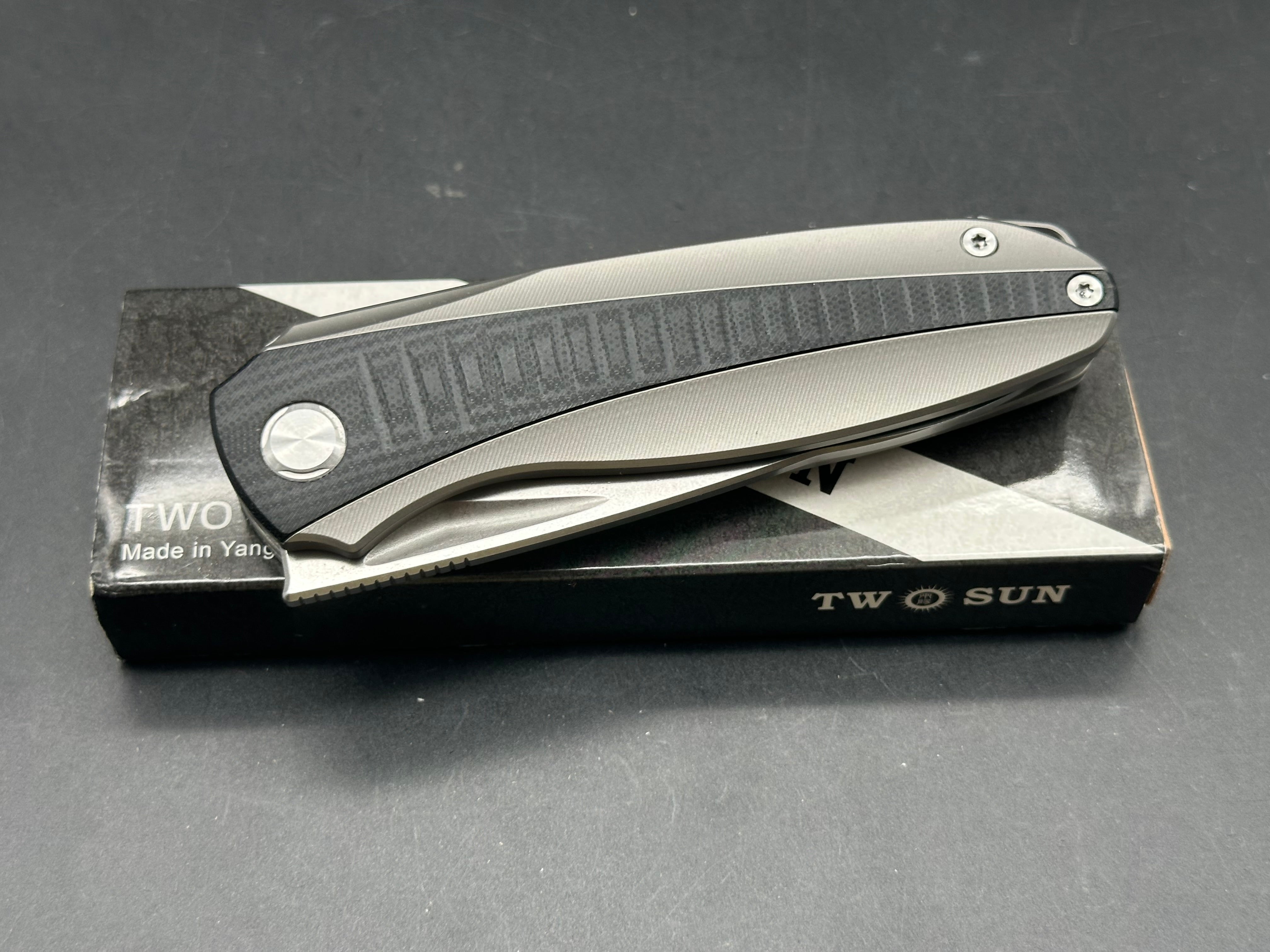 TwoSun TS483  Utilizator design, “Racer”, liner lock, titanium scales with black G10 inserts, 14c28n blade