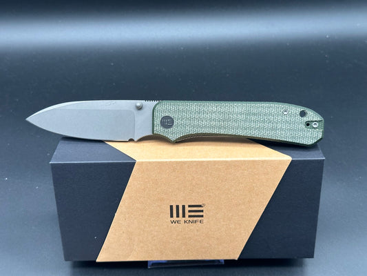 WE BIG BANTER FOLDING KNIFE GREEN CANVAS MICARTA HANDLE 20CV DROP POINT