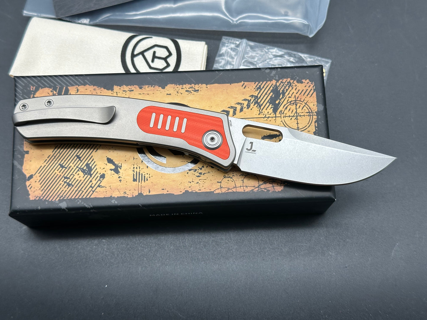 Kubey KB377A Common Thread, 3.35" M390 Stonewashed Blade with Orange G10 Inlay Titanium Handle