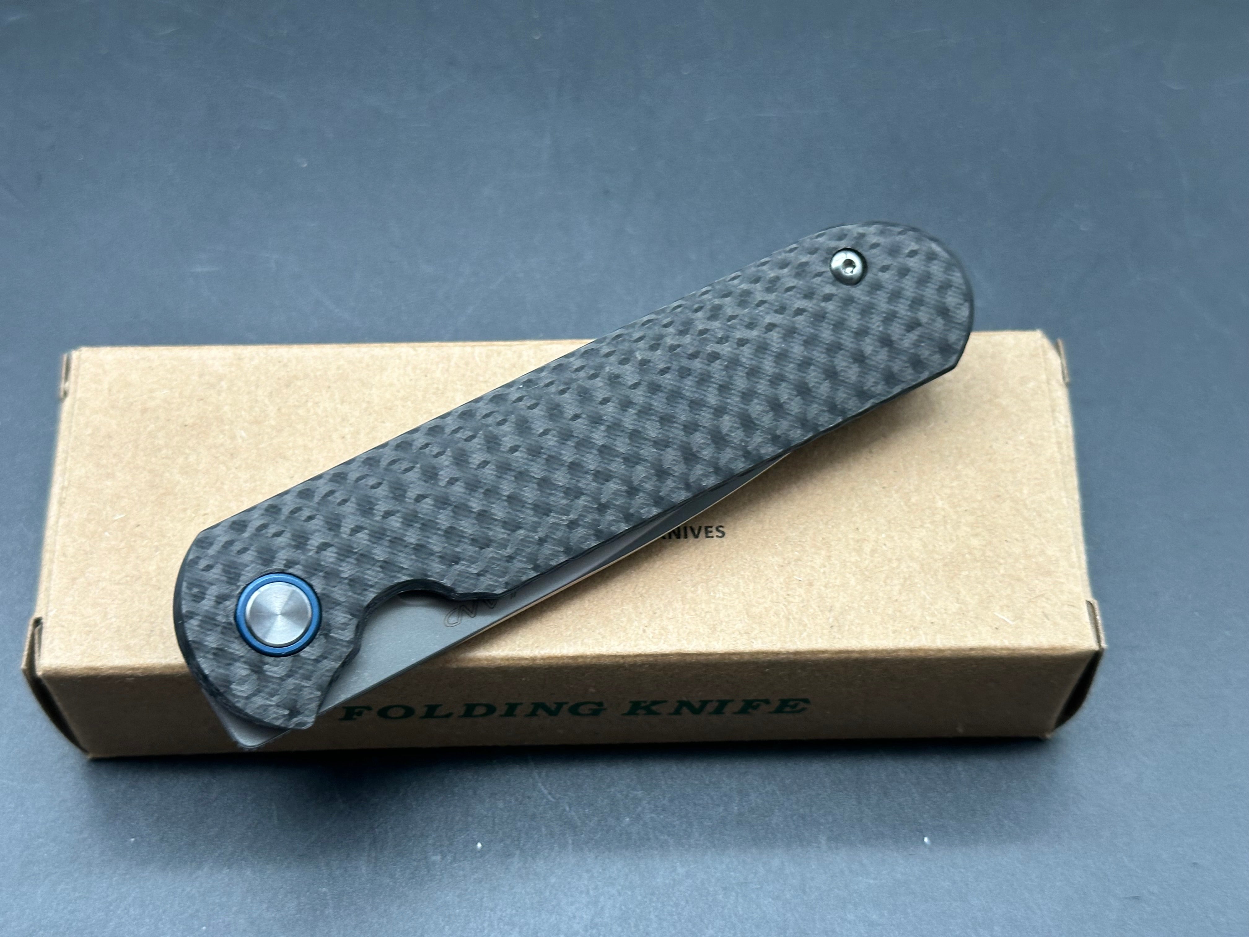 LAND 830 2.9" S35VN Stonewash Drop Point Blade with Carbon Fiber Handle