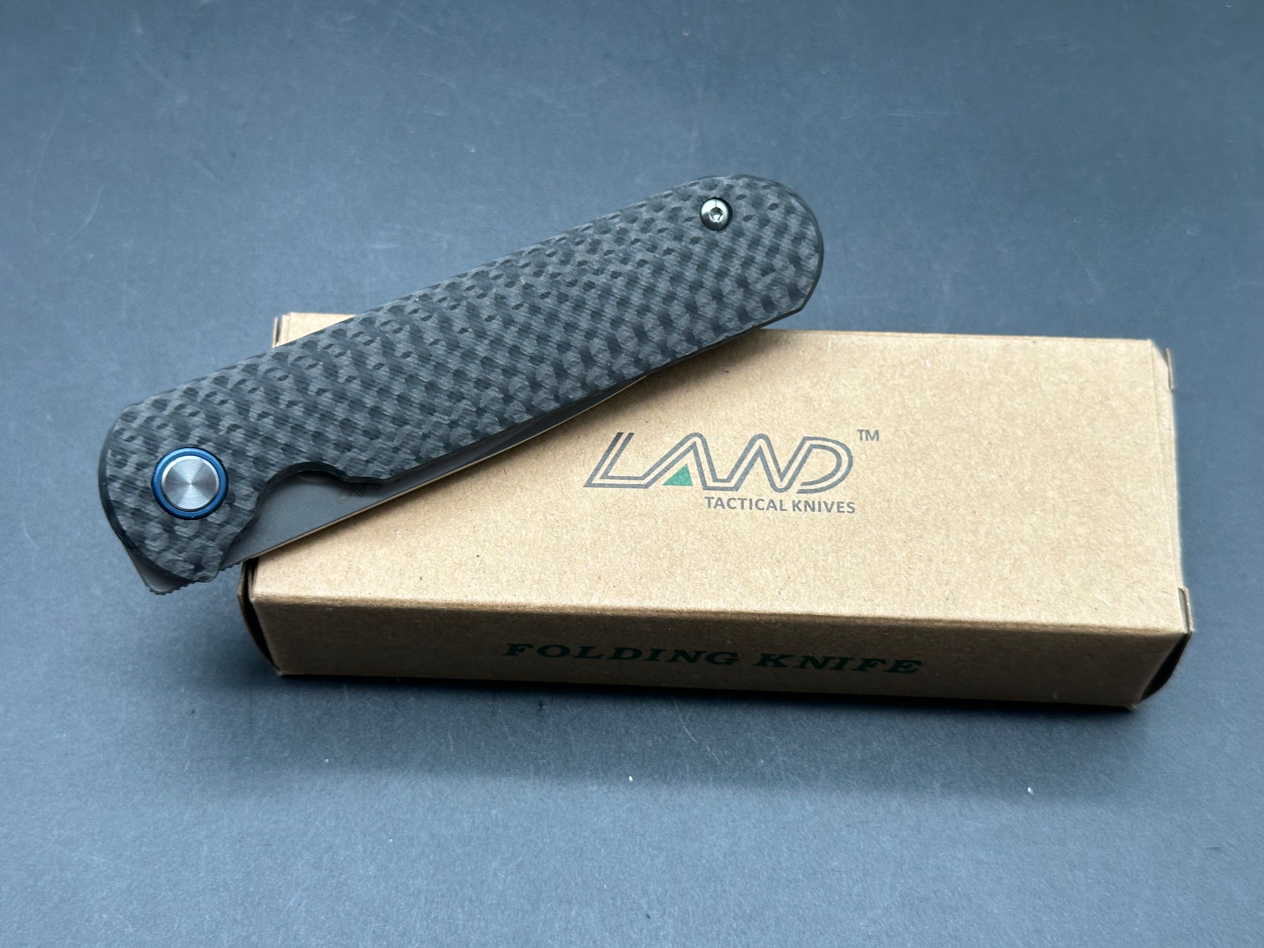 LAND 830 2.9" S35VN Stonewash Drop Point Blade with Carbon Fiber Handle