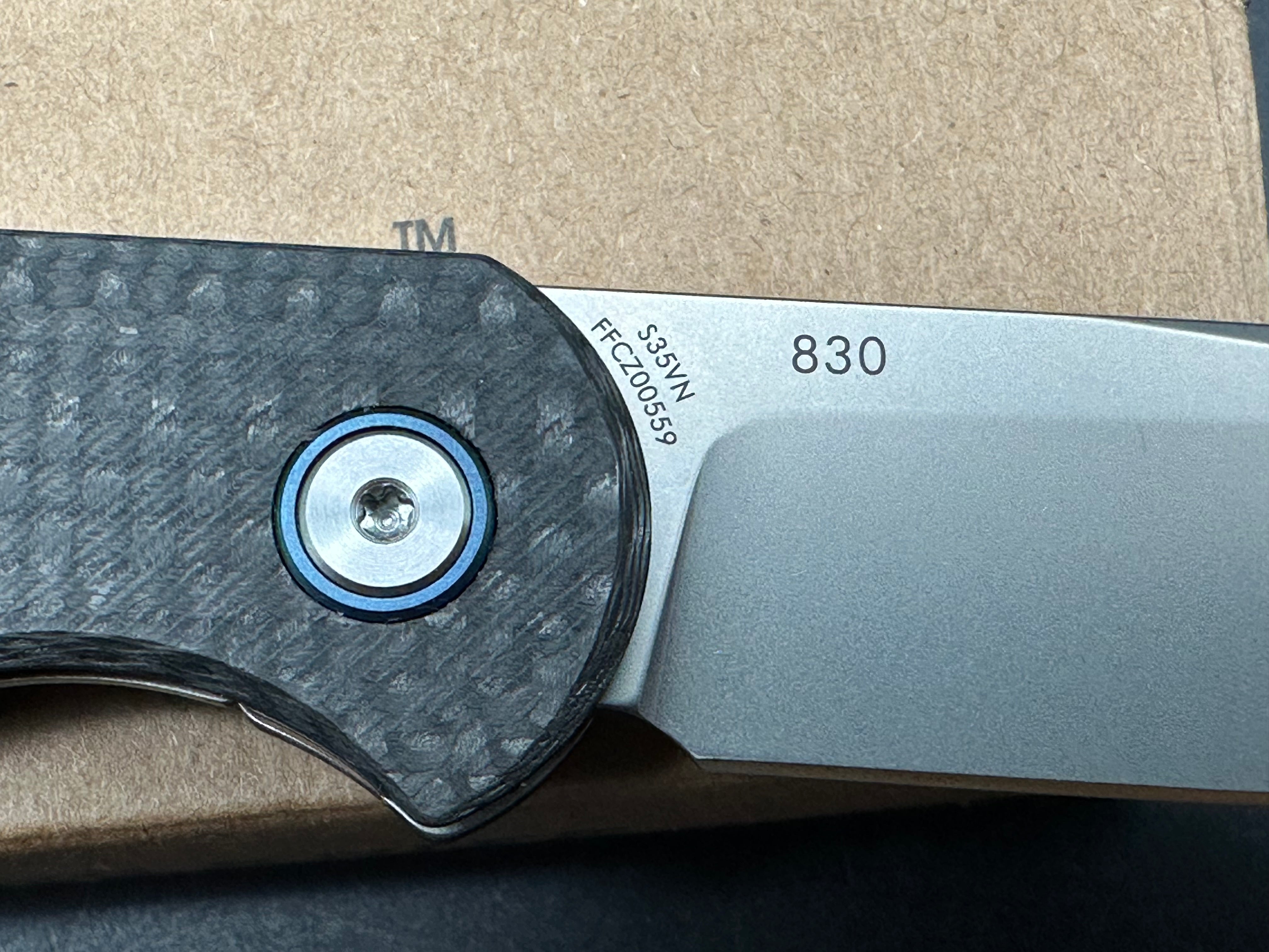 LAND 830 2.9" S35VN Stonewash Drop Point Blade with Carbon Fiber Handle