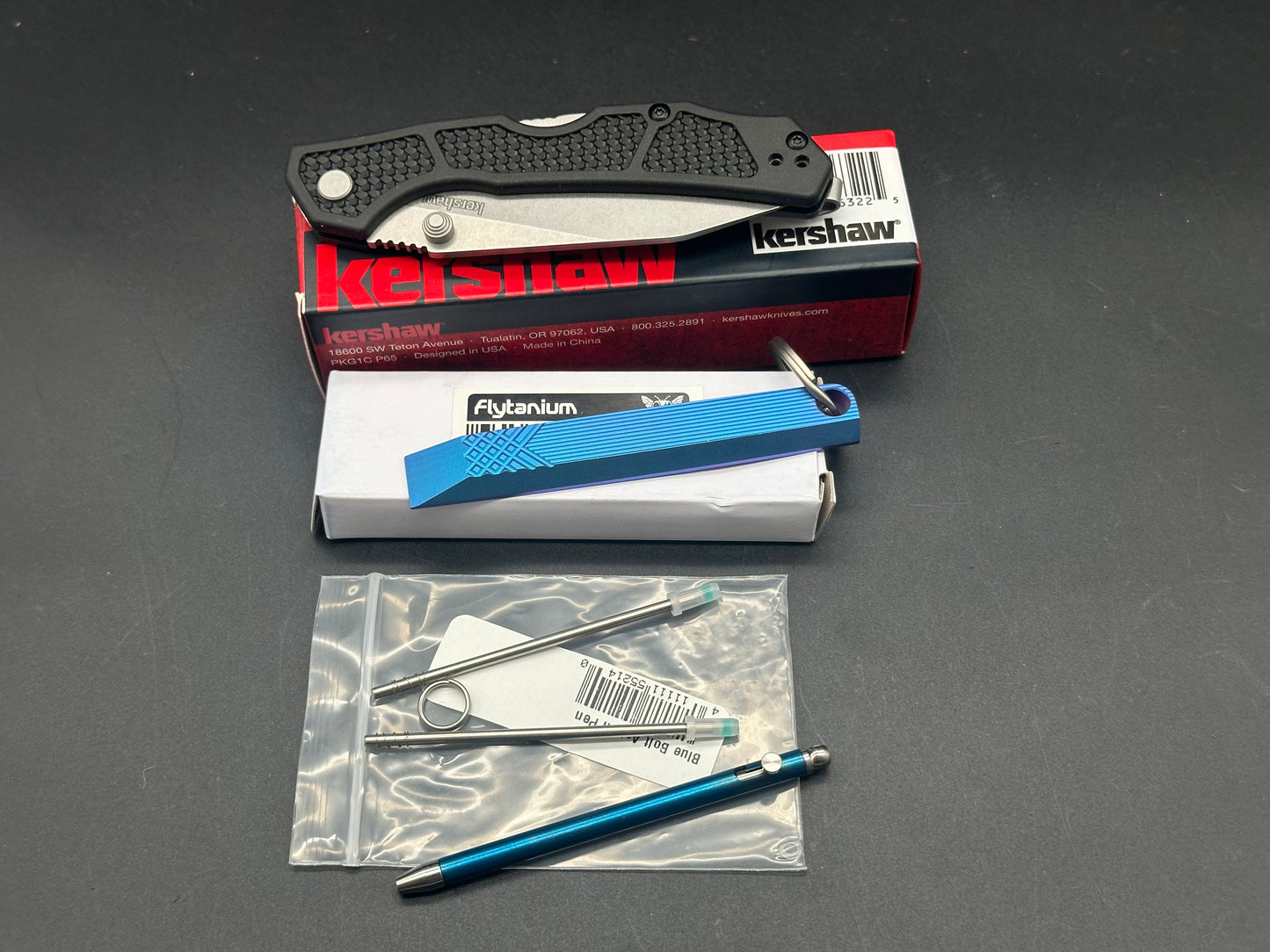 BladeHQ Promotional EDC Pack Set Kershaw Cargo Flytanium Prybar Bolt action pen