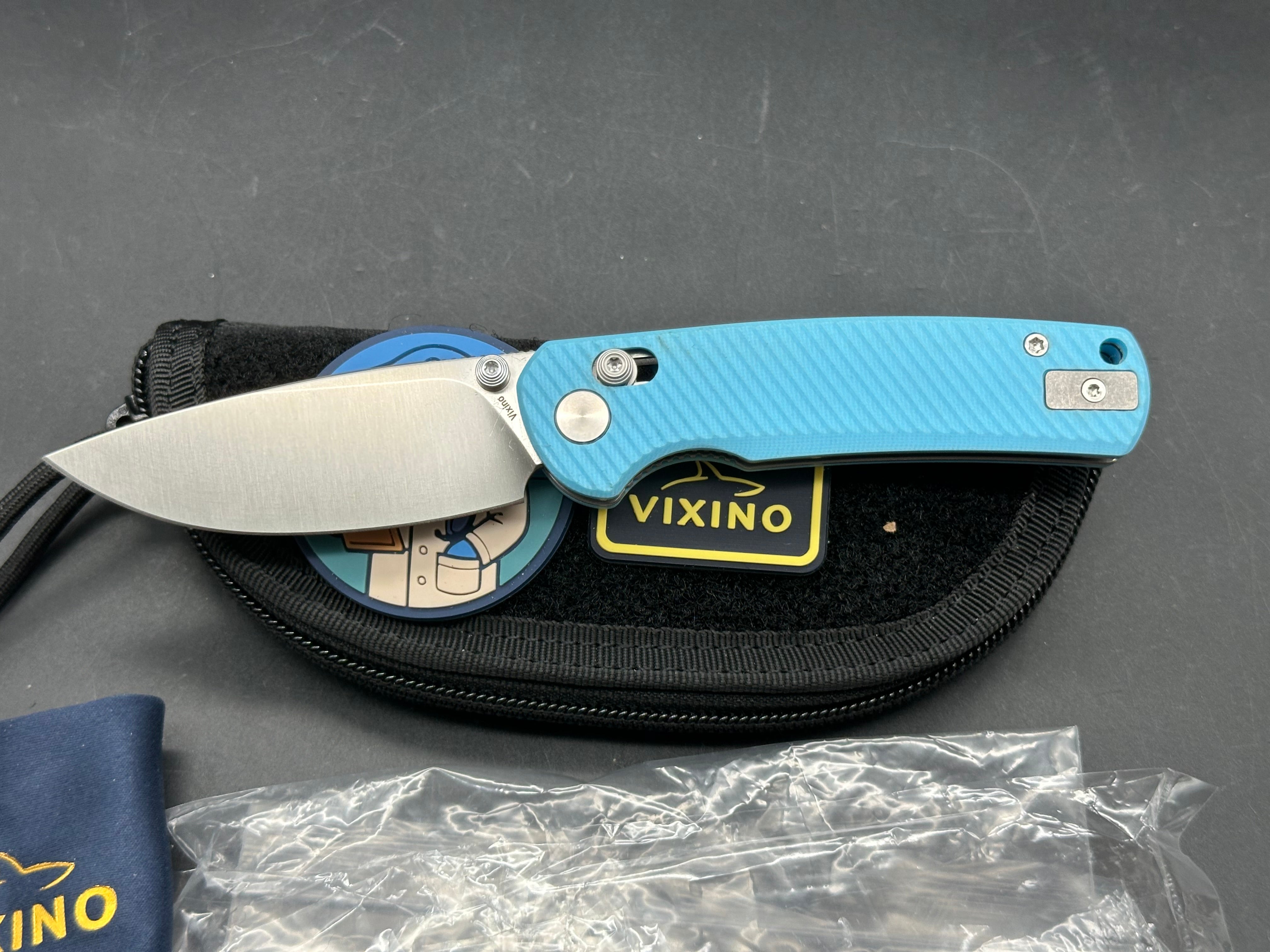 Vixino RockShark 3.03" 14C28N Satin Blade with Light Blue Angle Milled G10 Scales