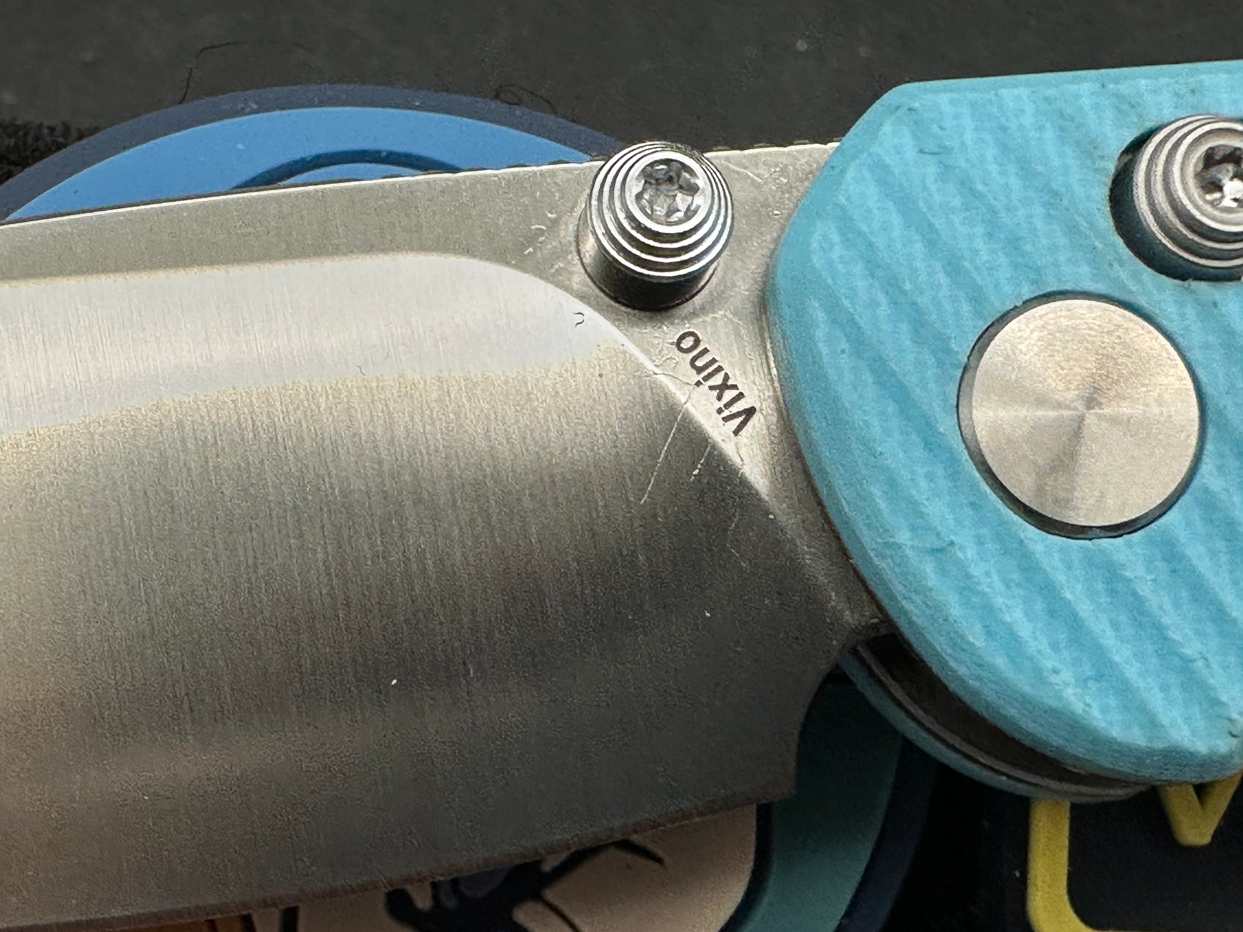 Vixino RockShark 3.03" 14C28N Satin Blade with Light Blue Angle Milled G10 Scales