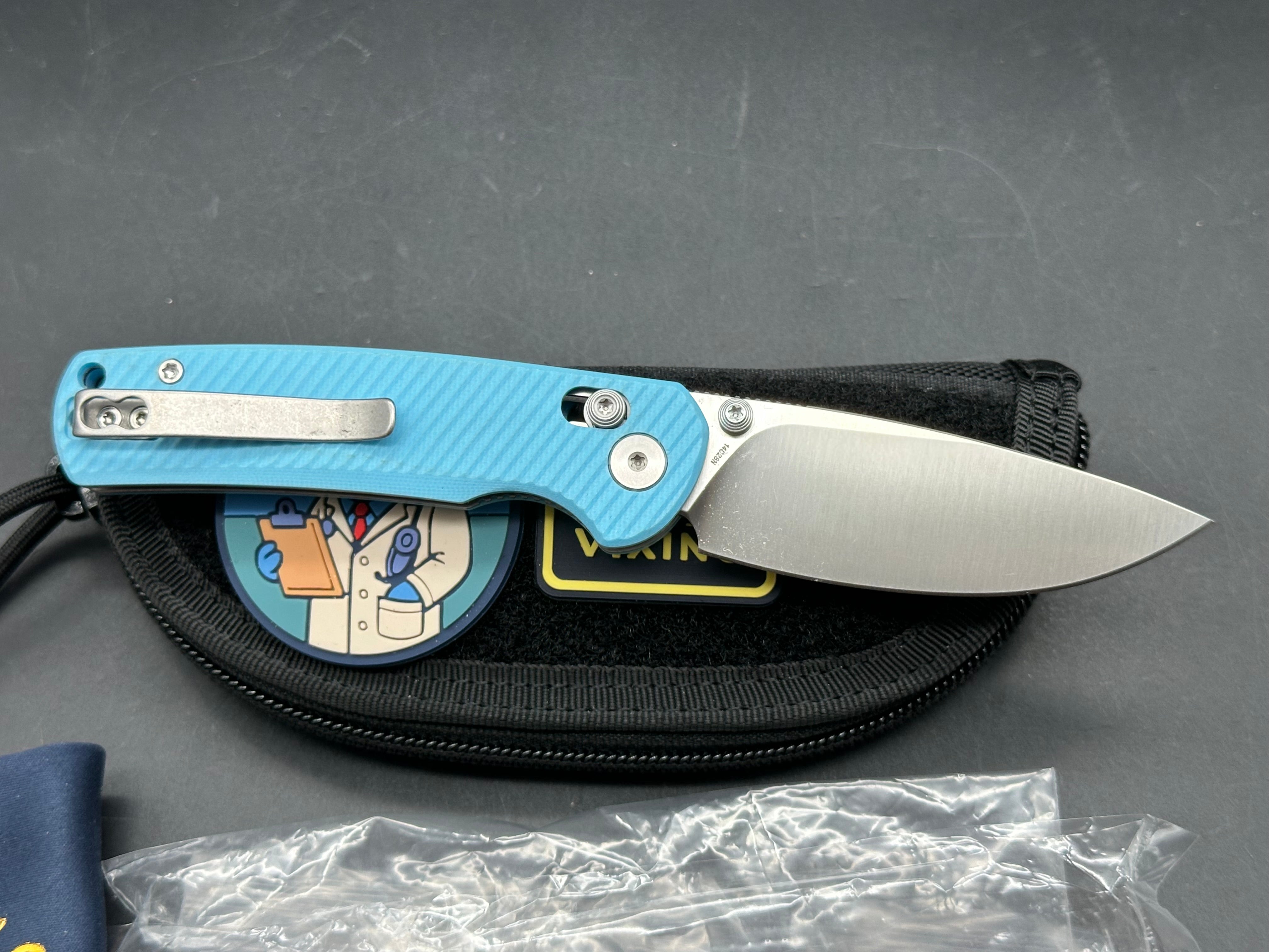 Vixino RockShark 3.03" 14C28N Satin Blade with Light Blue Angle Milled G10 Scales