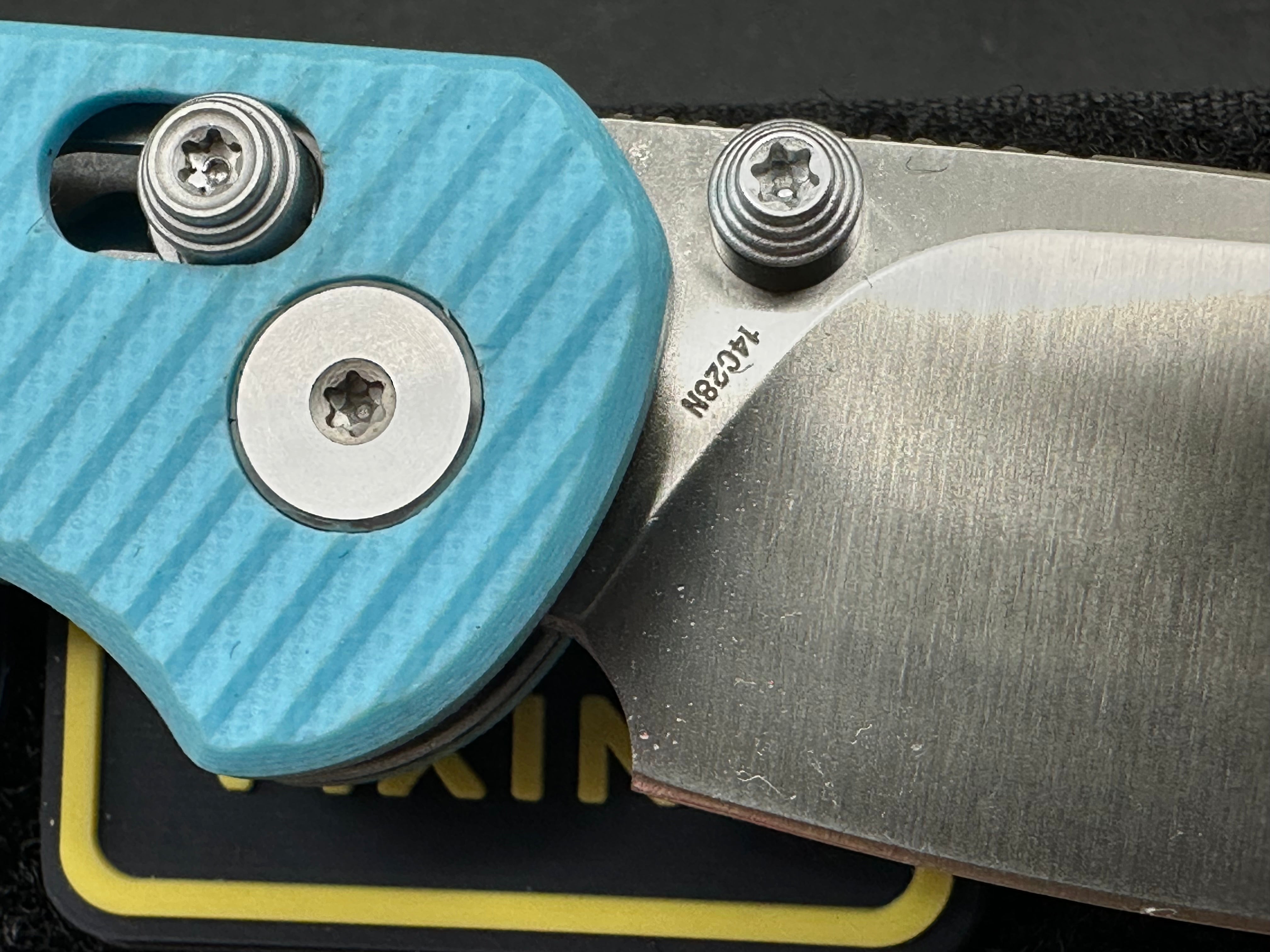 Vixino RockShark 3.03" 14C28N Satin Blade with Light Blue Angle Milled G10 Scales