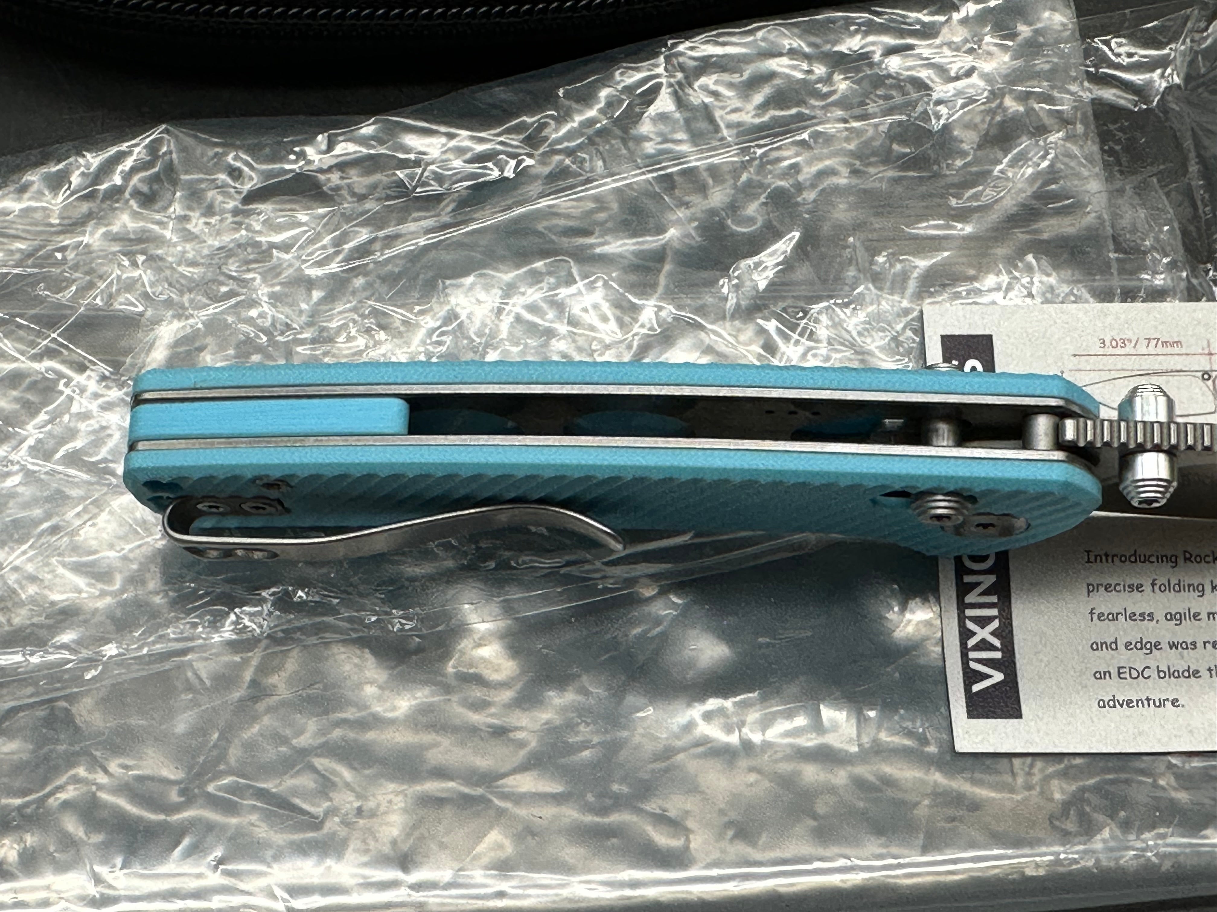 Vixino RockShark 3.03" 14C28N Satin Blade with Light Blue Angle Milled G10 Scales