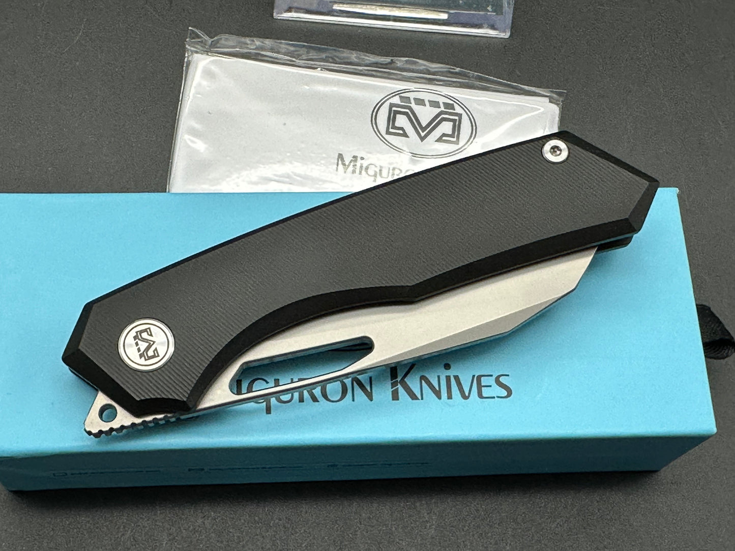 Miguron Keryx II Front Flipper, Sandblasted M390 Blade, Black PVD Titanium Handles