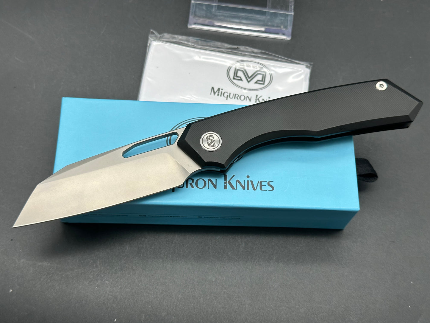 Miguron Keryx II Front Flipper, Sandblasted M390 Blade, Black PVD Titanium Handles