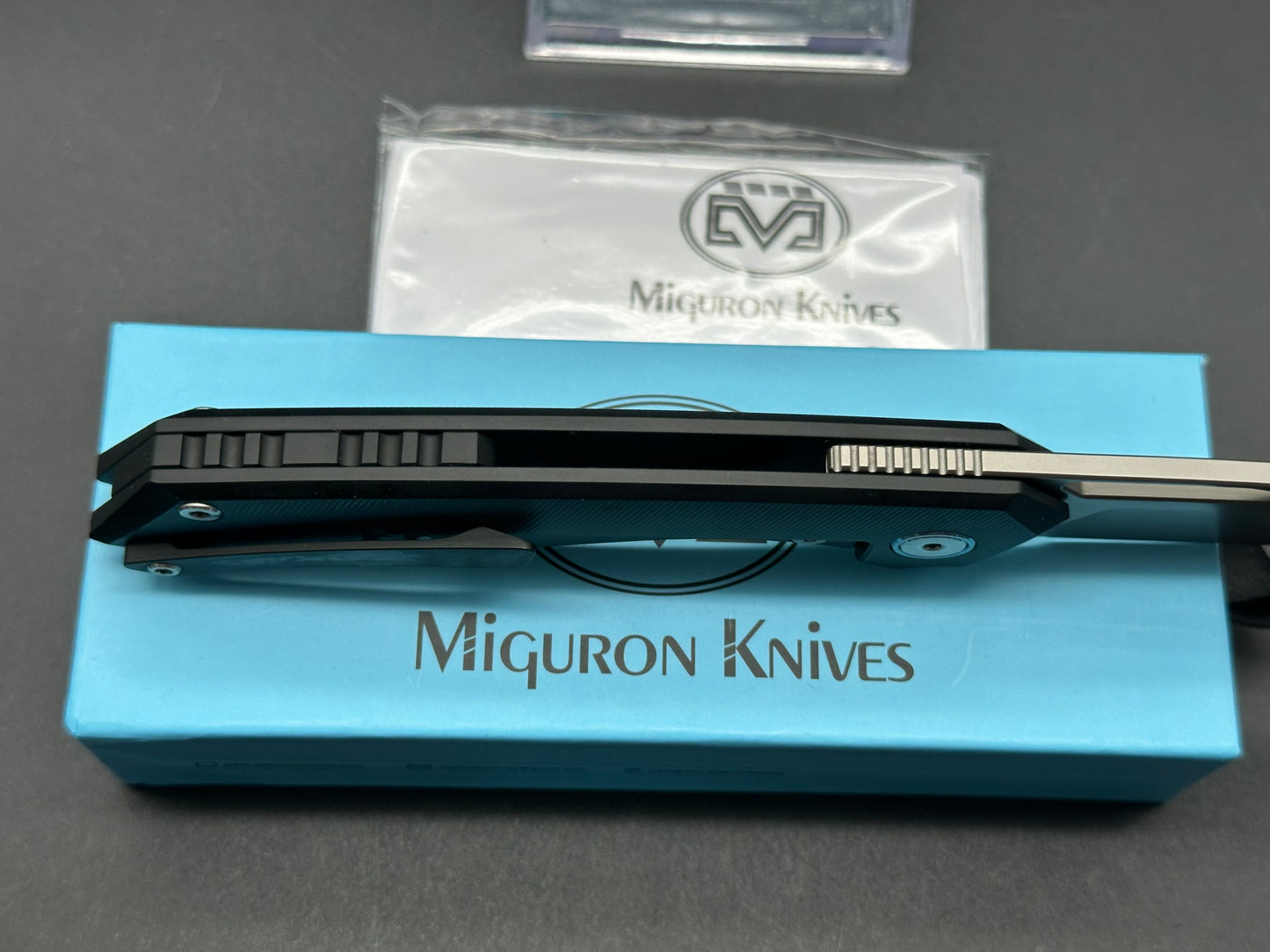 Miguron Keryx II Front Flipper, Sandblasted M390 Blade, Black PVD Titanium Handles