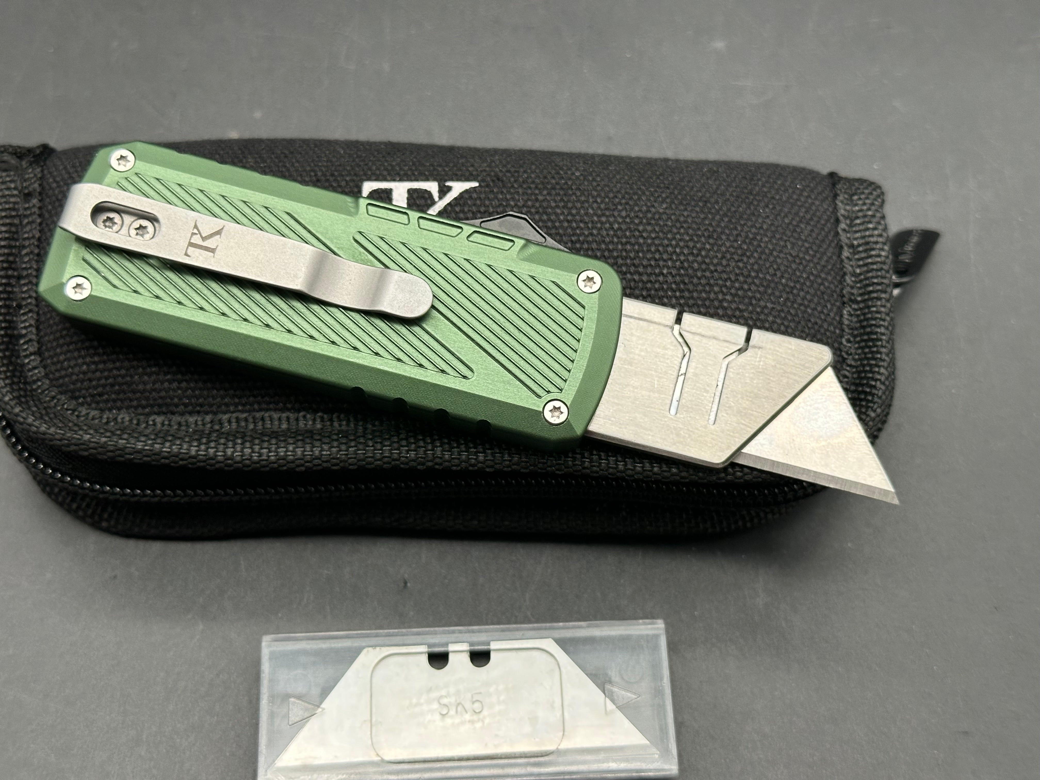 TacKnives – Zipper Green aluminum OTF utility knife