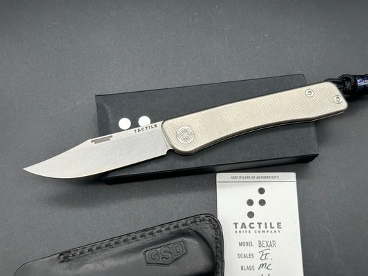 Tactile Bexar Titainum Magnacut has leather slip and timascus bead