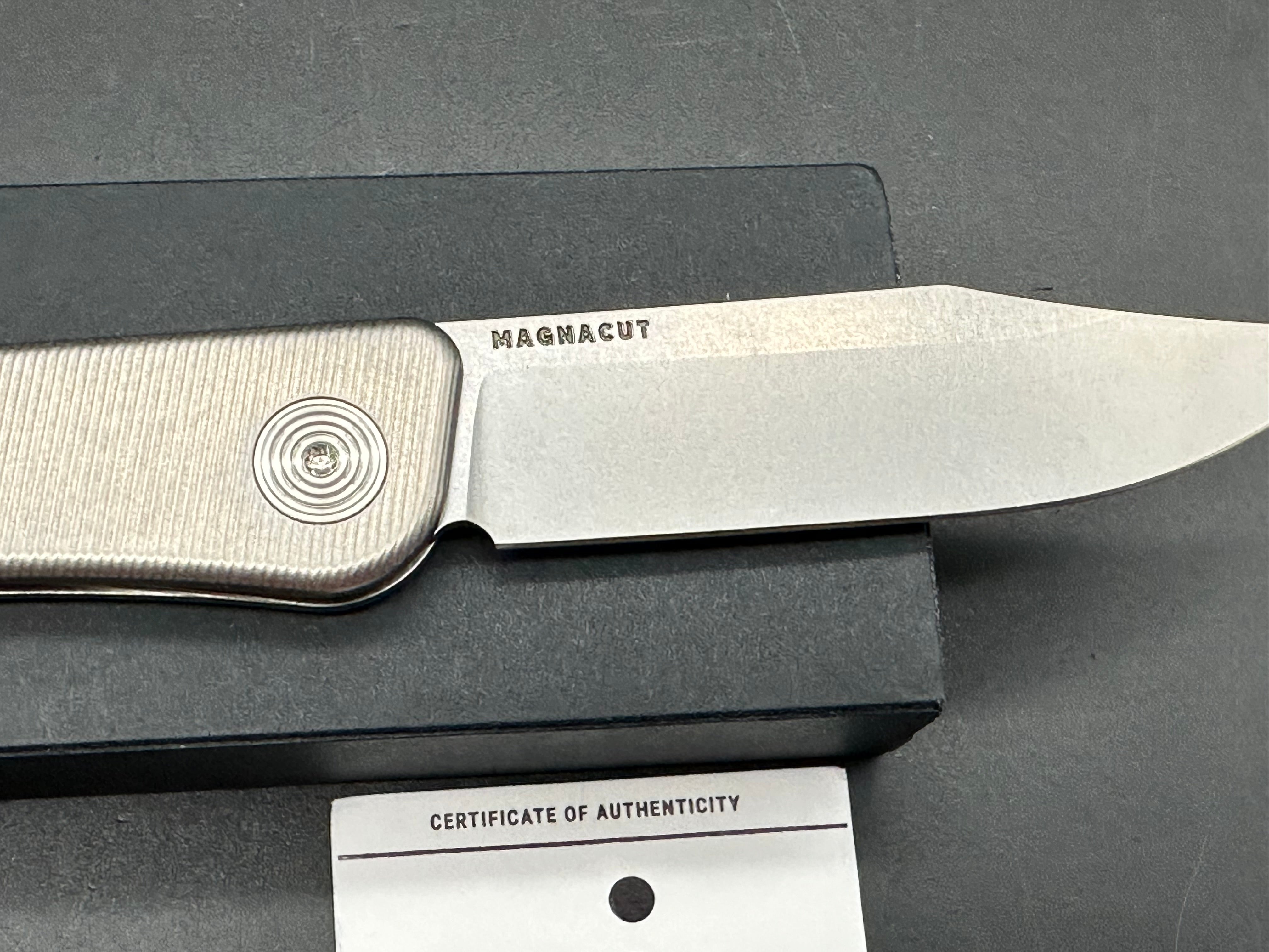 Tactile Bexar Titainum Magnacut has leather slip and timascus bead