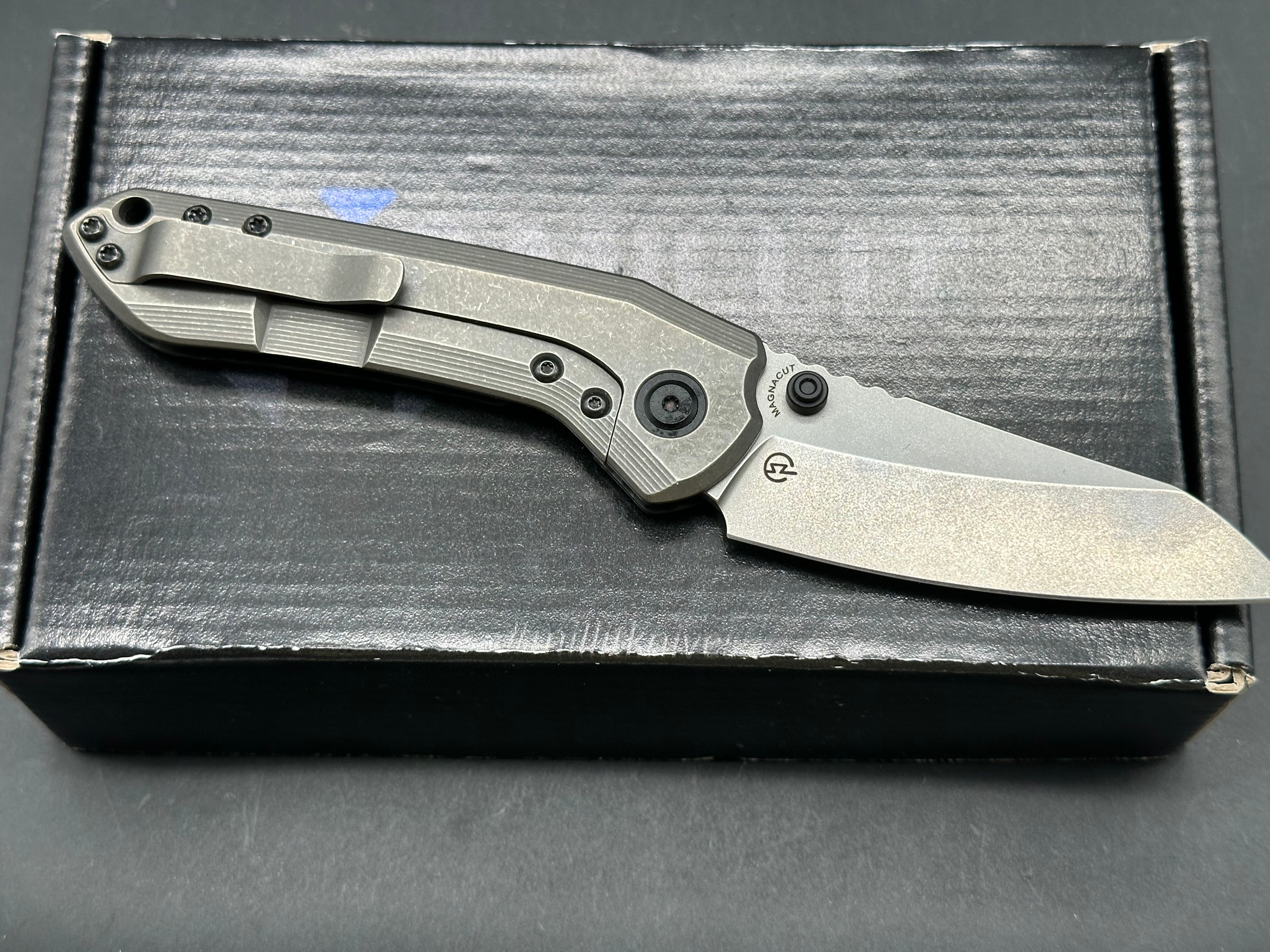 Millit / TJ Schwarz Overland, 3.17" MagnaCut Stonewash Blade with Carbon Fiber and Stonewash Titanium Frame Lock